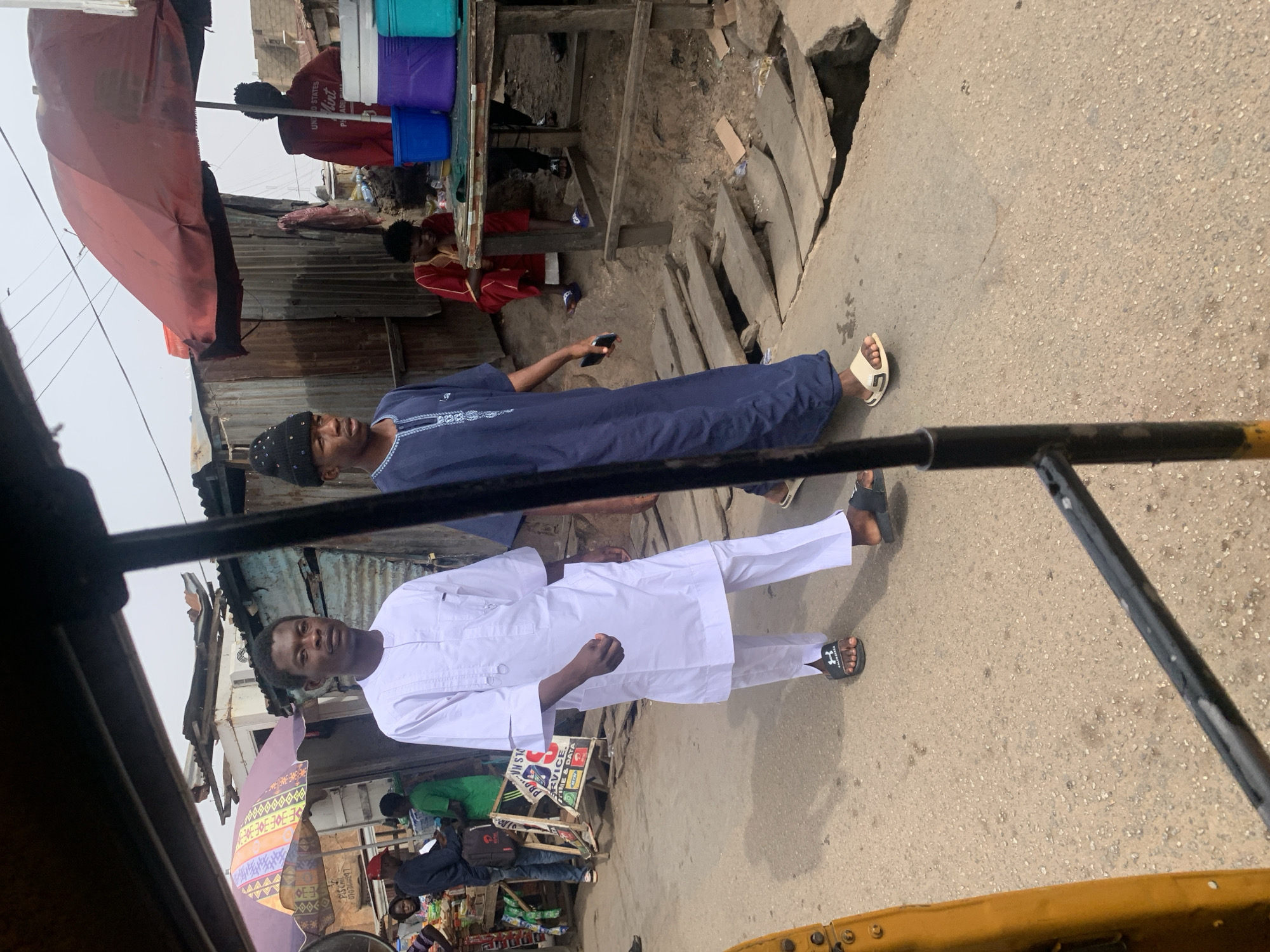 Daytime street view captured from keke in Jos, Nigeria