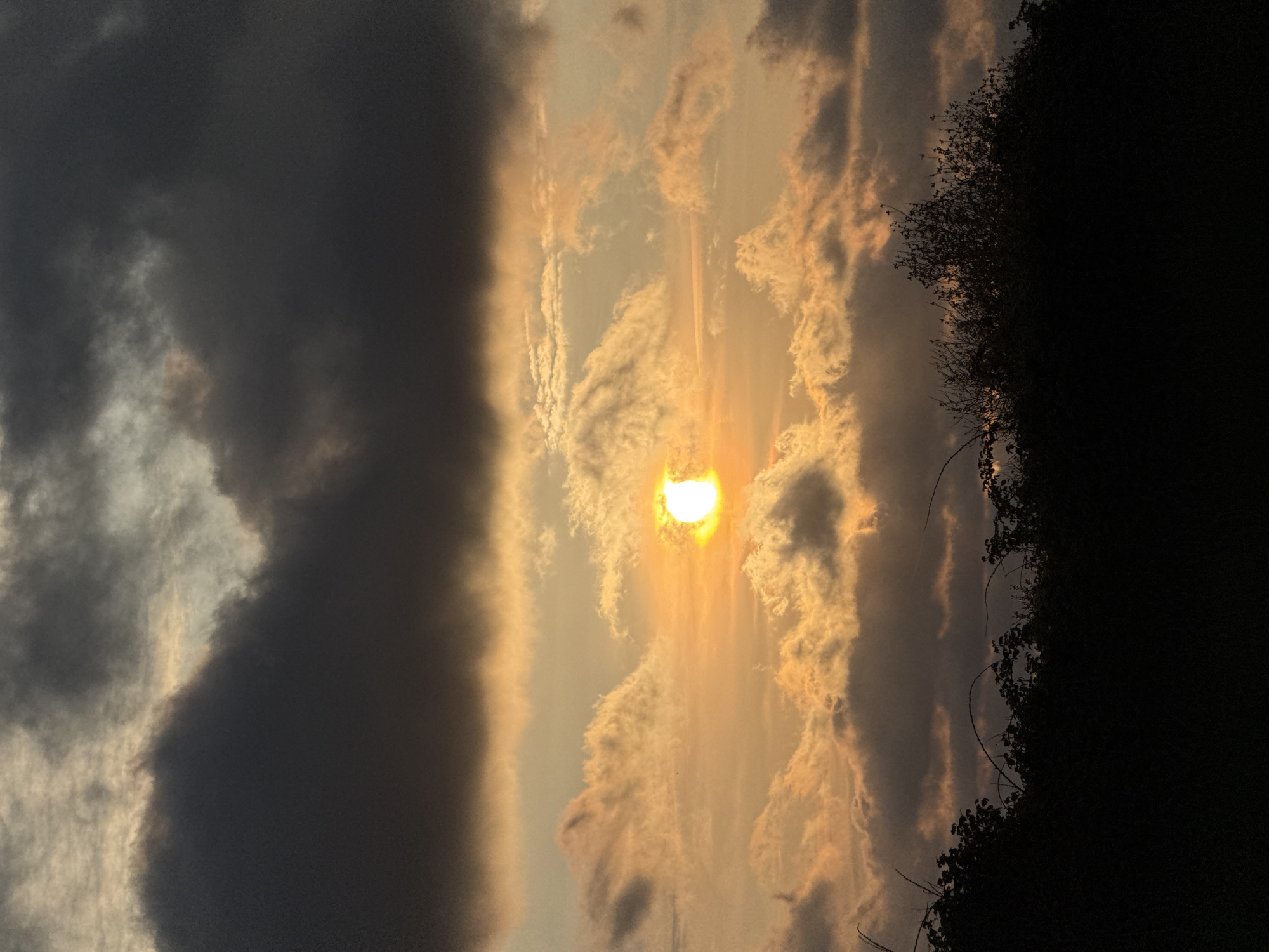 Dramatic sunset observed through storm clouds in Great Yarmouth