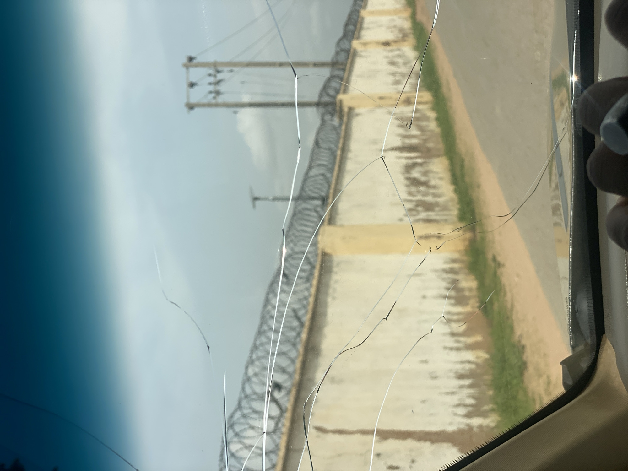 Car journey documented through residential Howayi, Nigeria neighborhoods