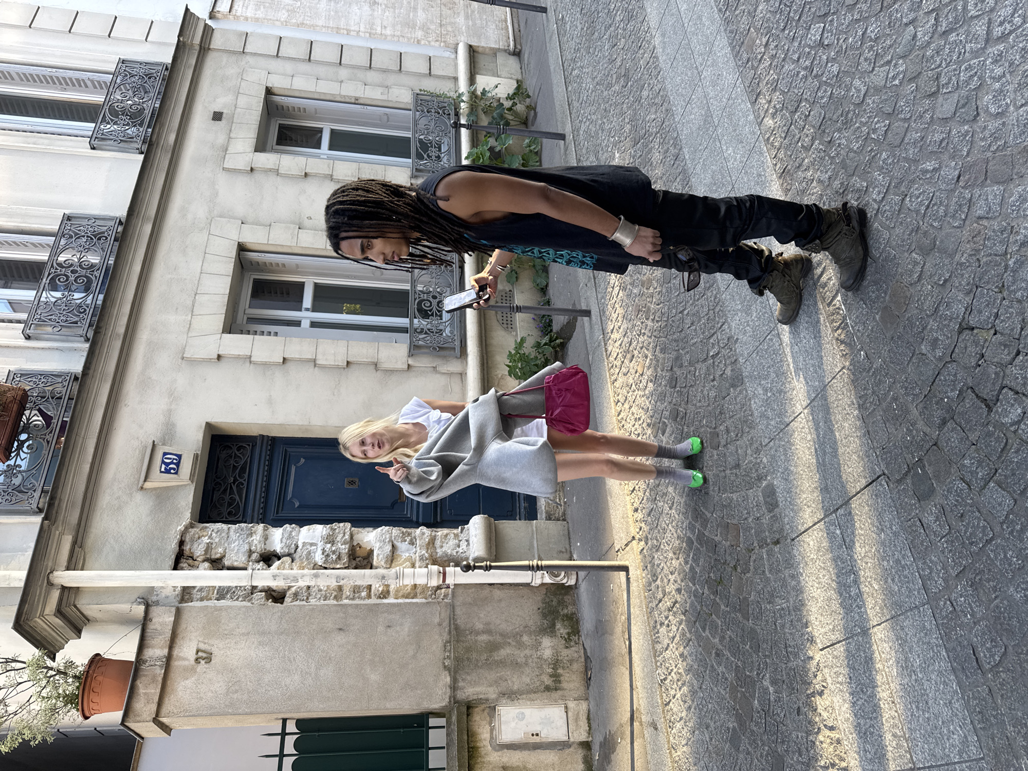 Casual street scenes captured across Paris neighborhood during evening hours