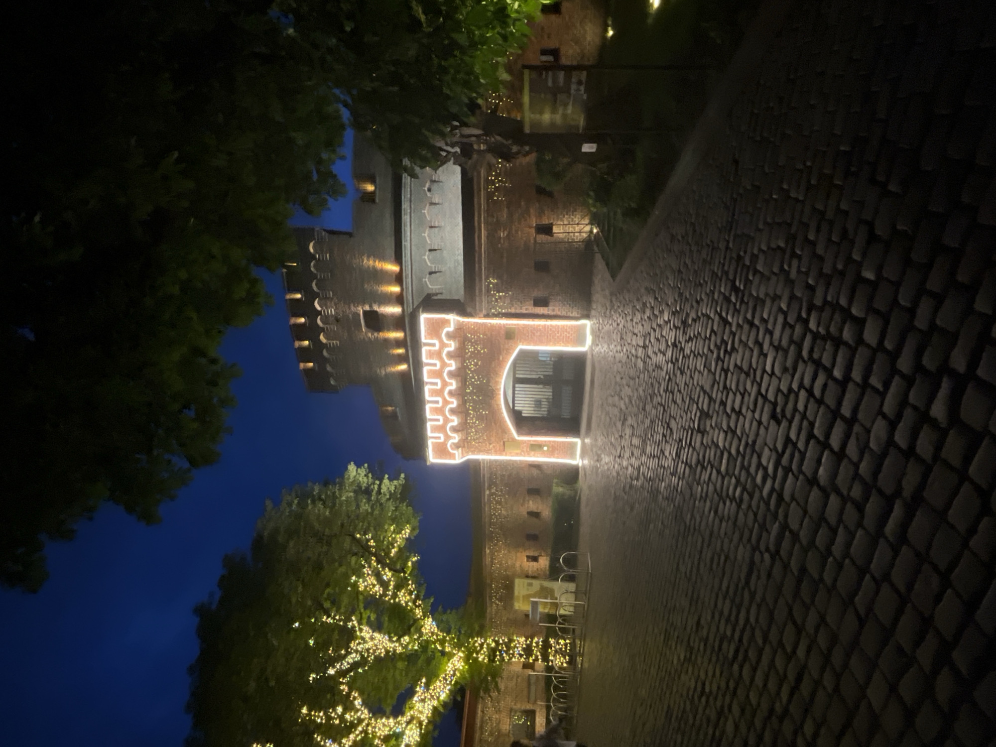 Kaliningrad's King's Gate lit up on a summer evening