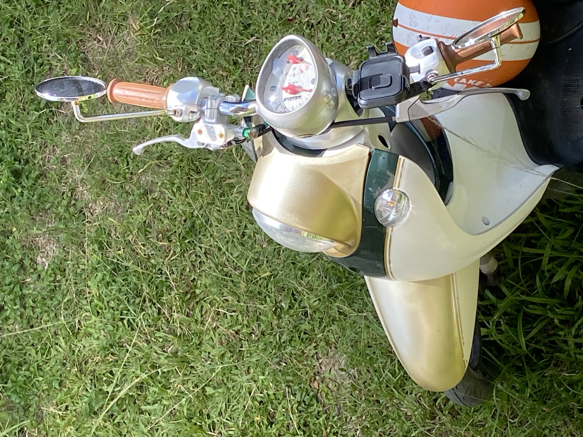 Morning moments: vintage scooter, digital devices, work diary tag