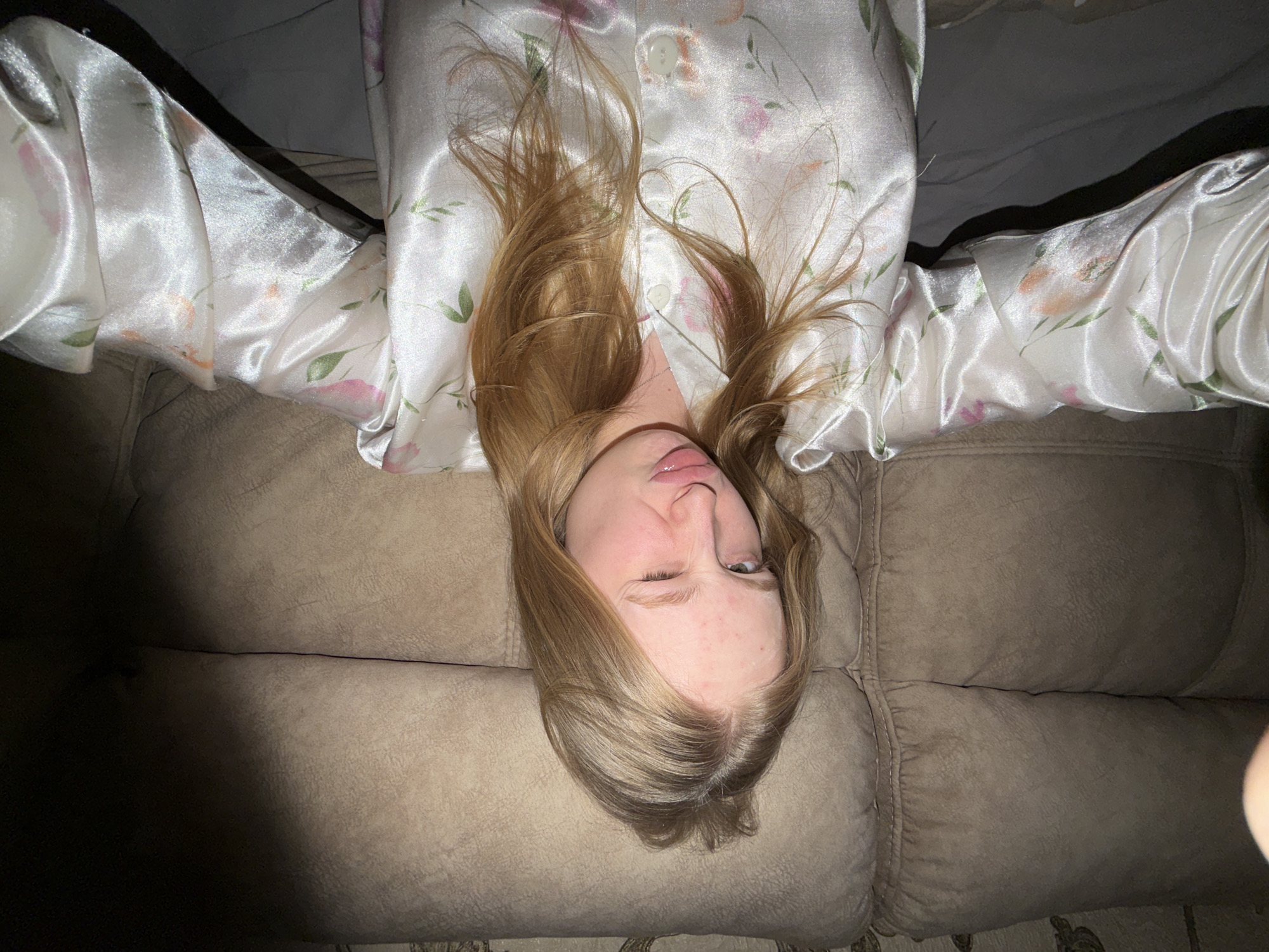 Woman relaxes at home in Penza, Russia evening