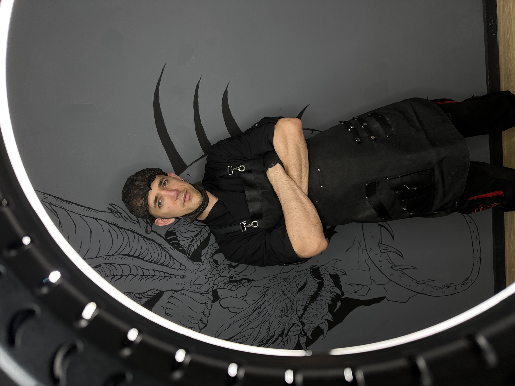 Chef poses against dragon mural in Saratov