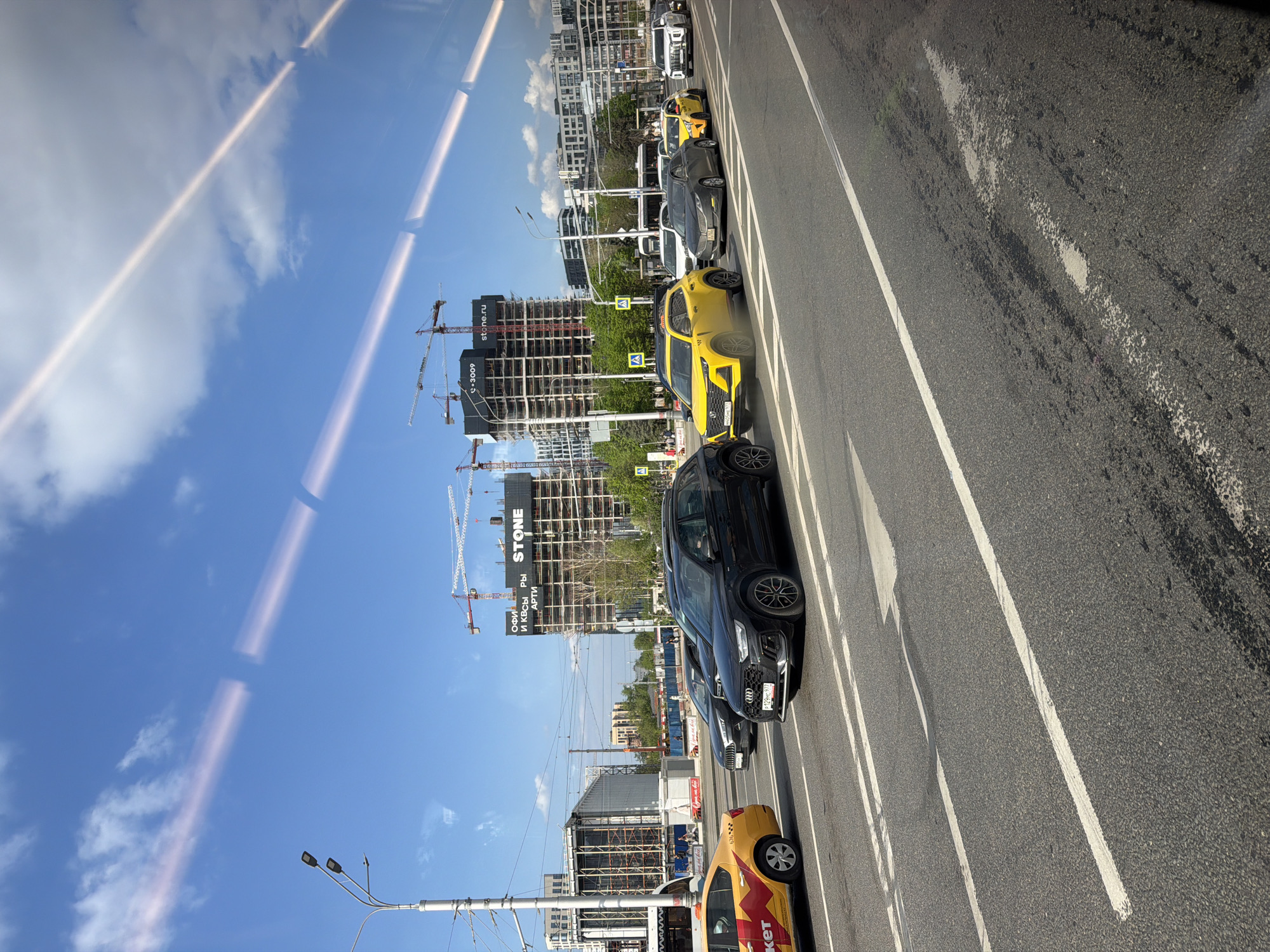 Moscow street scenes documented by observers during midday traffic