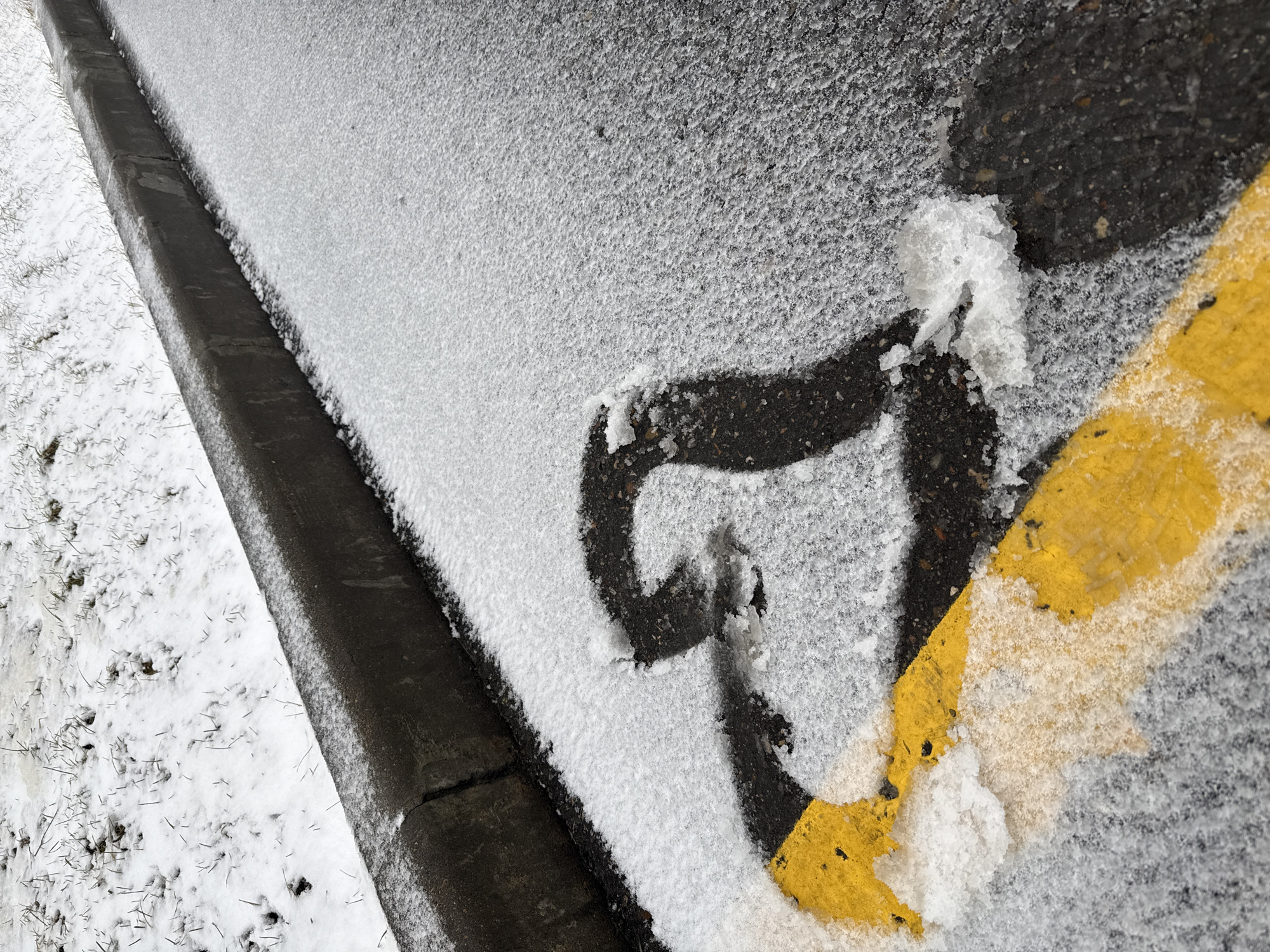 Late spring snow blankets Lupanovo amid routine delivery activities