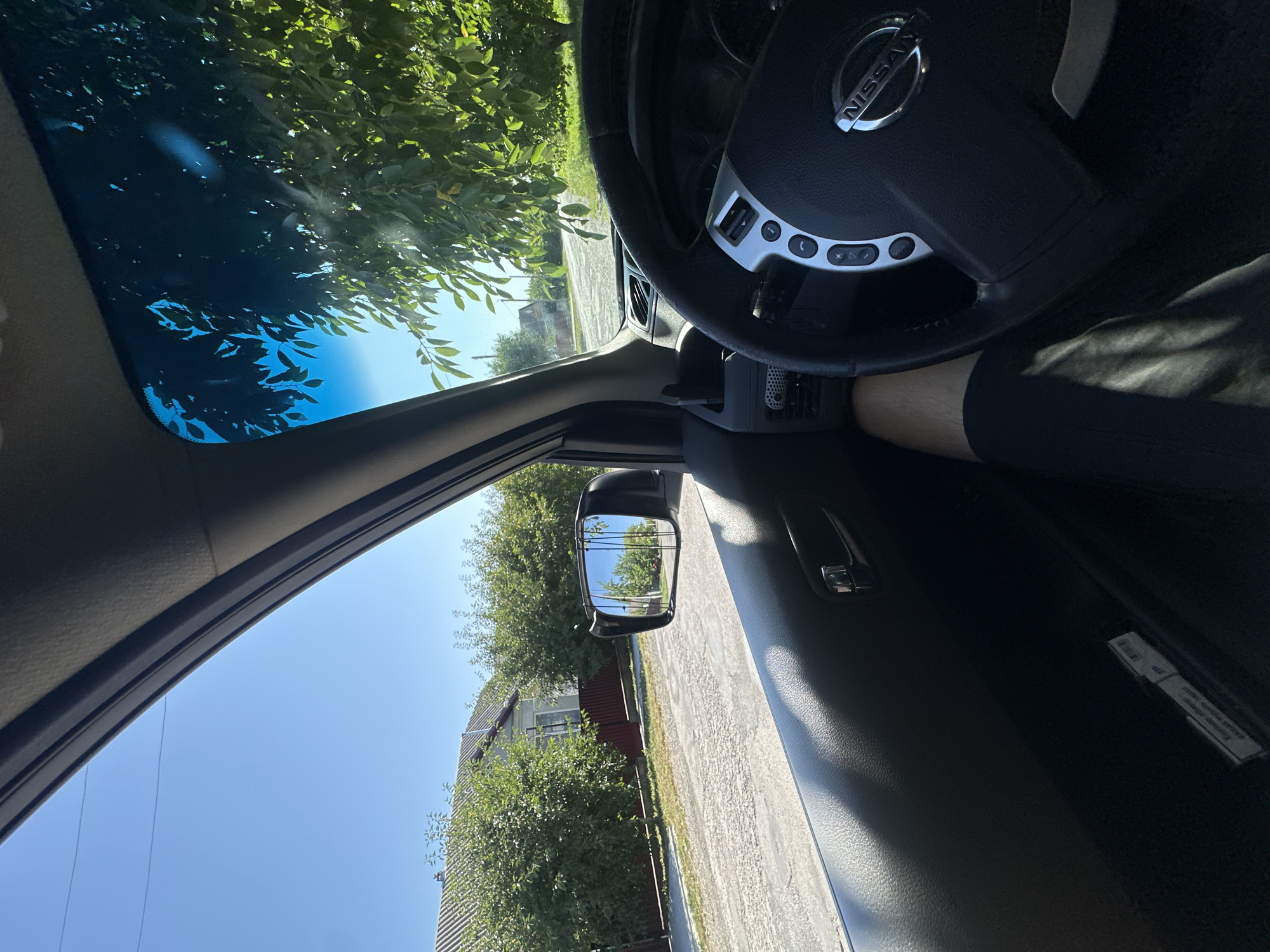 Inside a Nissan on a sunny morning in Shatava, Ukraine