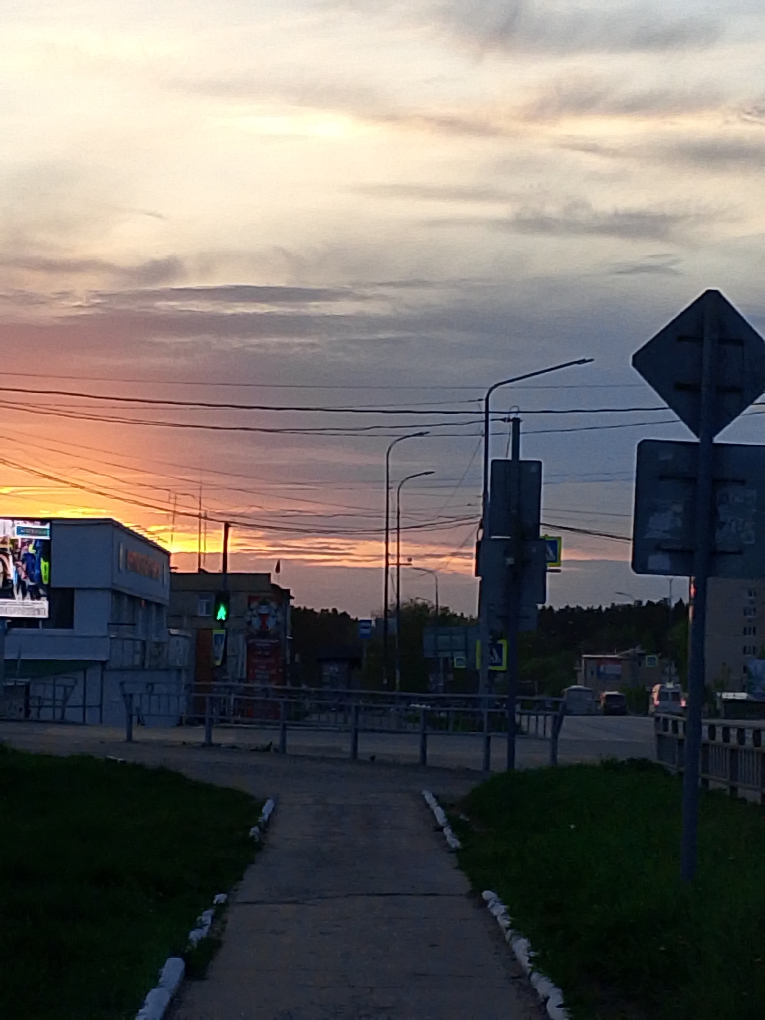 Sunset drive documented through Chaikovsky, Russia streets