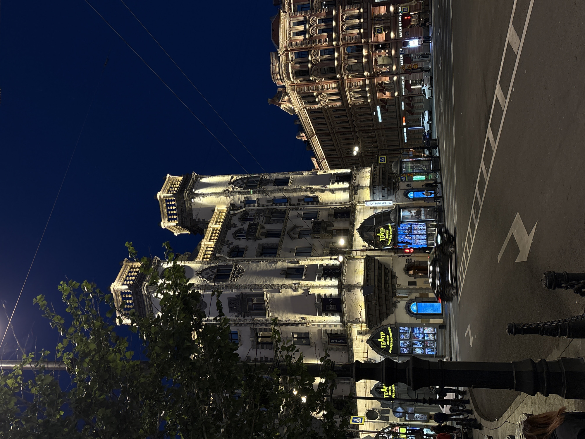 Nevsky Prospekt at night, plus a quirky wall sculpture nearby
