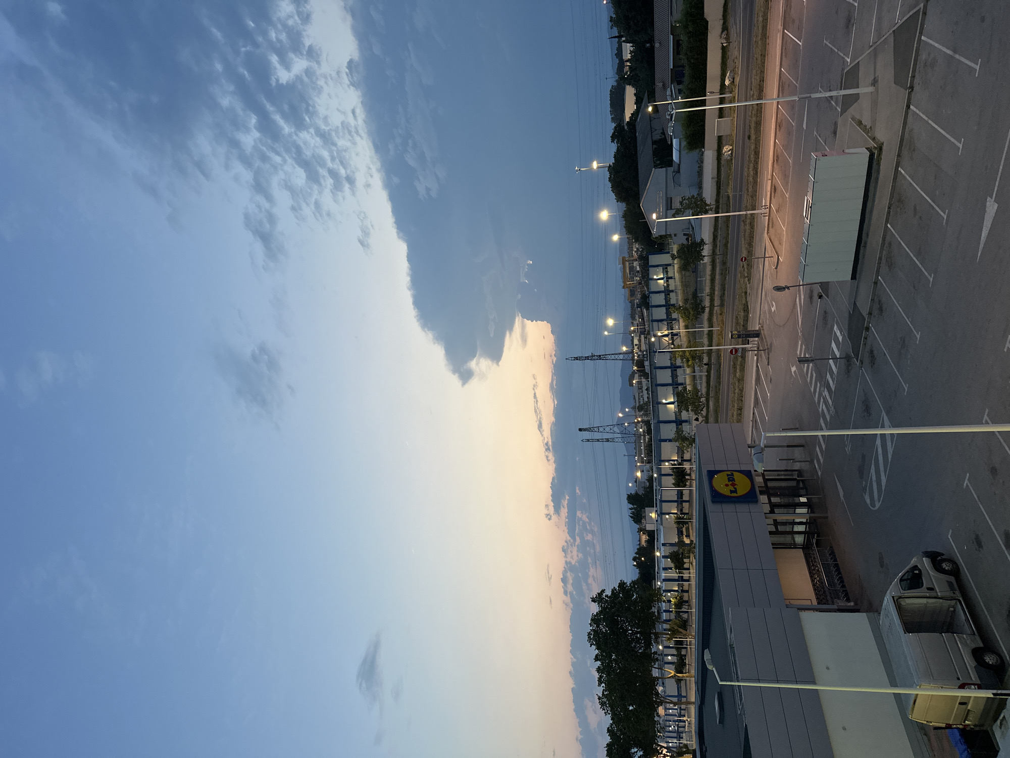 Dusk at a Perpignan Lidl, selfies included