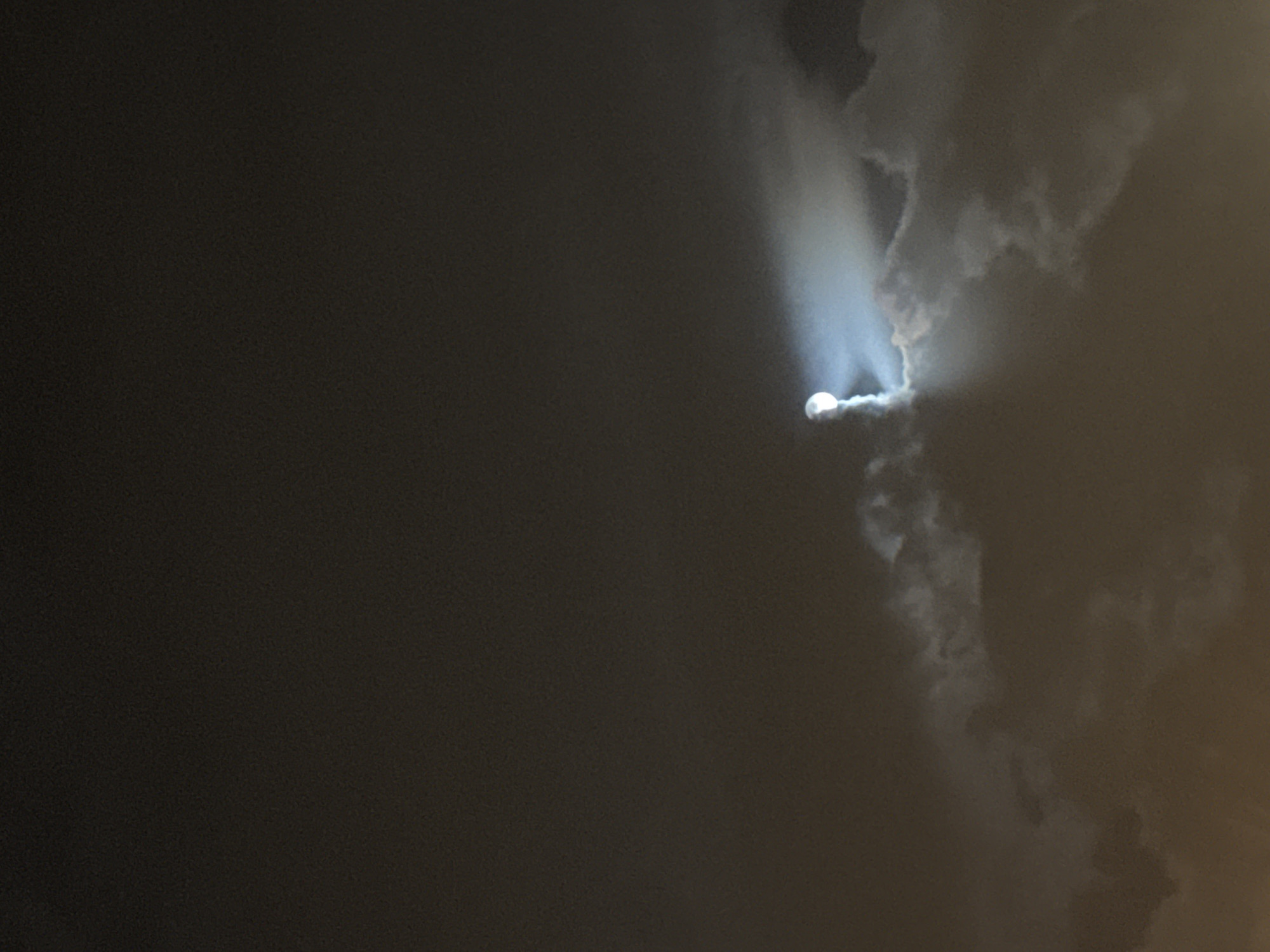 Bright circular object with trails observed in Moscow night sky