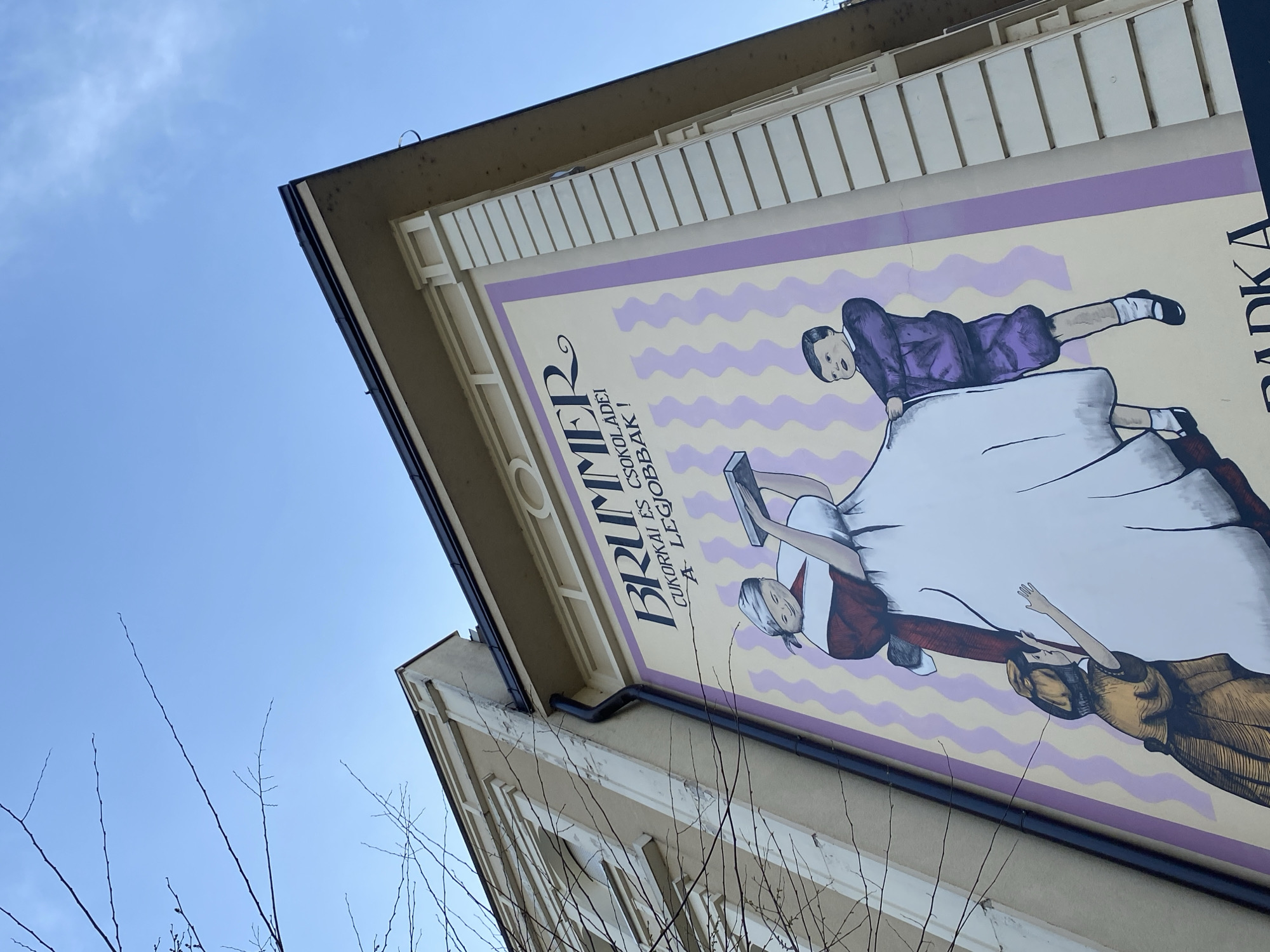 Mural featuring multiple figures spotted on Subotica building
