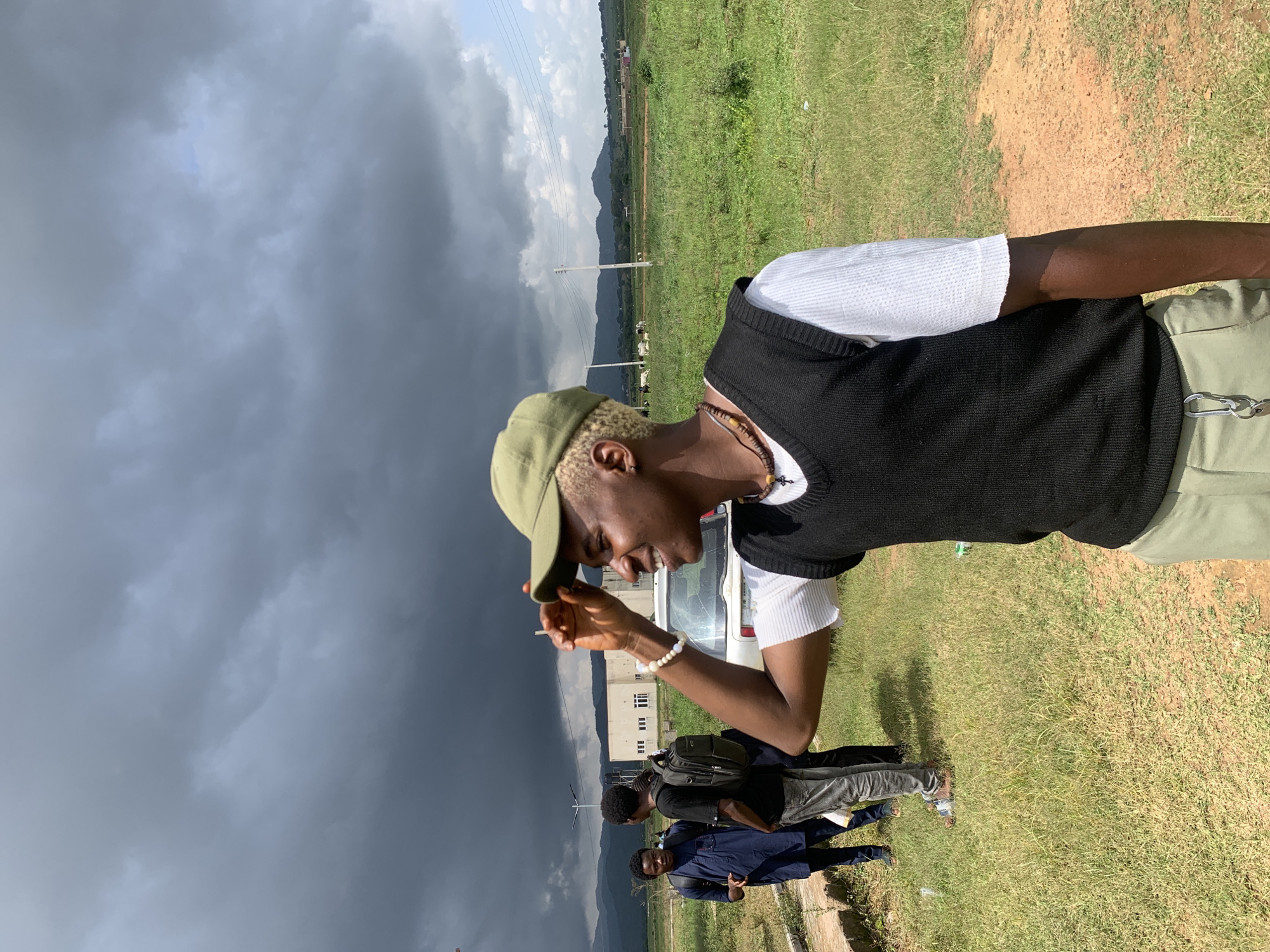 Casual group hangout in Gwafan, Nigeria on a cloudy afternoon