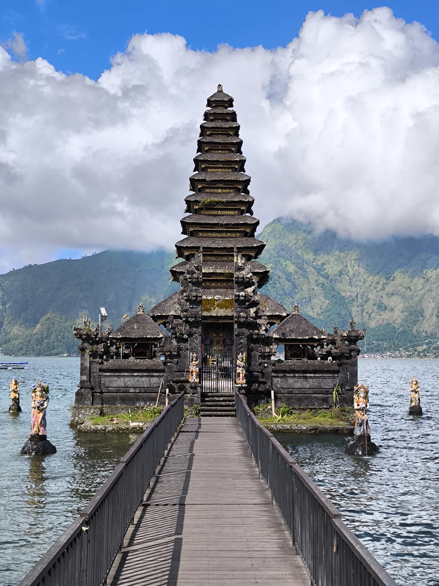 Temple visitors document Bali's Ulun Danu Beratan and local wildlife