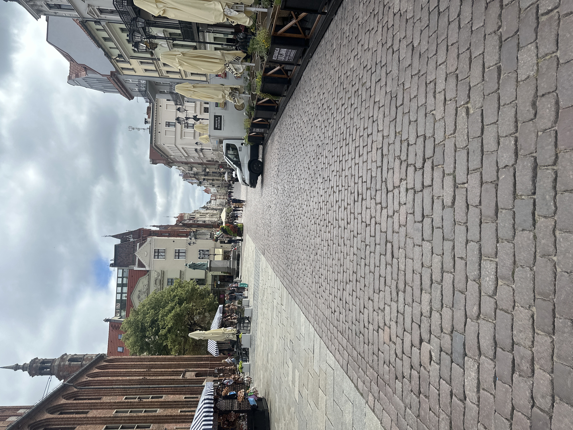 Toruń Old Town streets, architecture, and landmarks on a cloudy morning