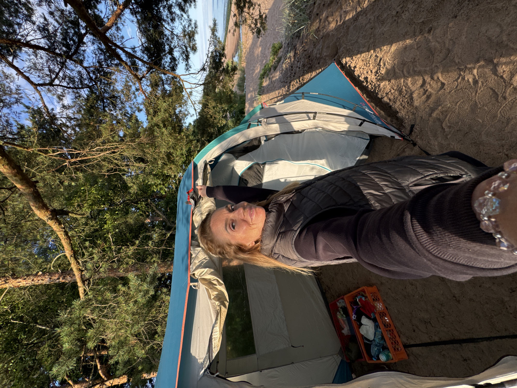 Beachside tent selfie at a sandy Russian shoreline