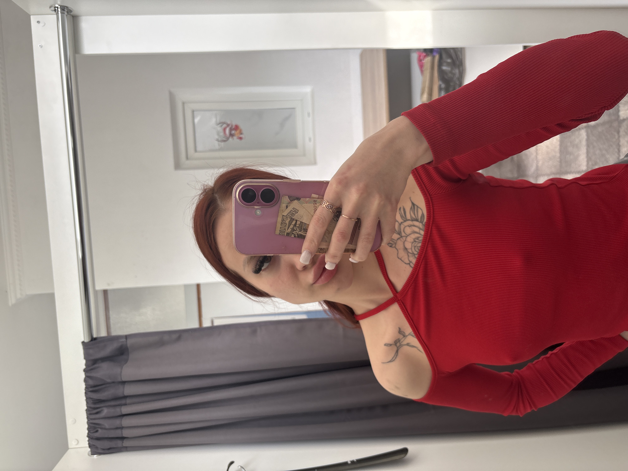 Woman takes fitting room selfies in Simferopol