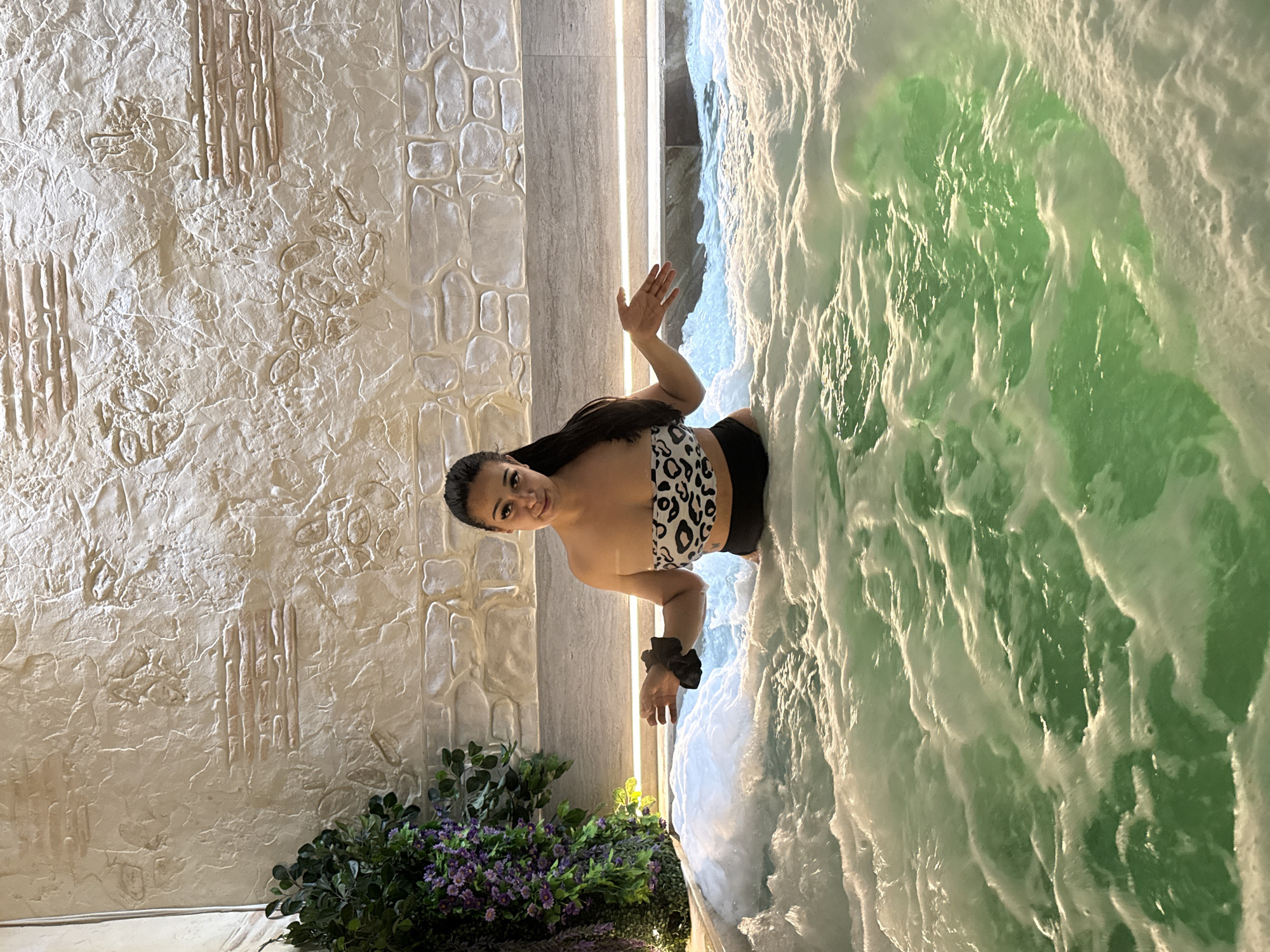 Woman enjoys hot tub at Sofia spa facility