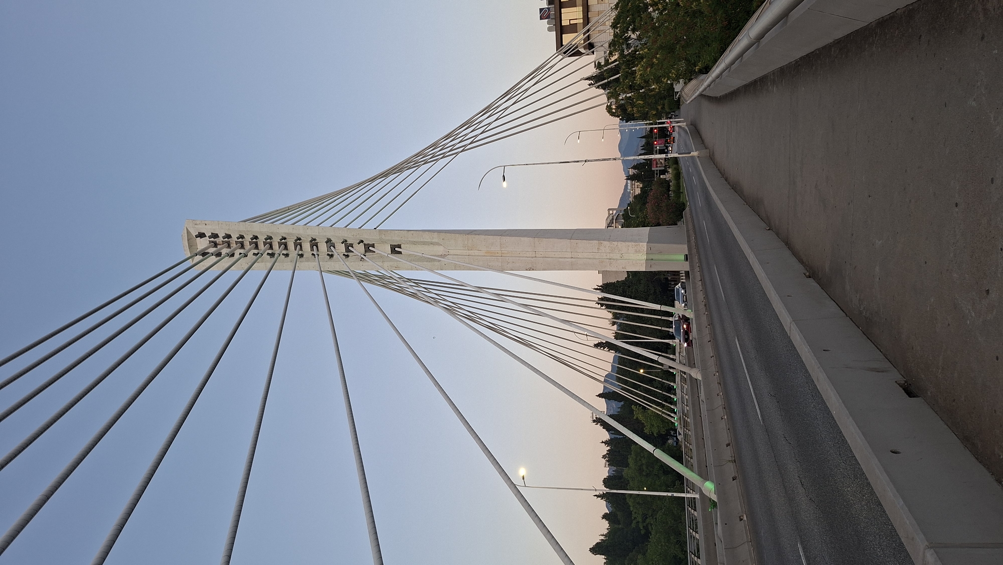 Podgorica's Millennium Bridge and city center at dusk