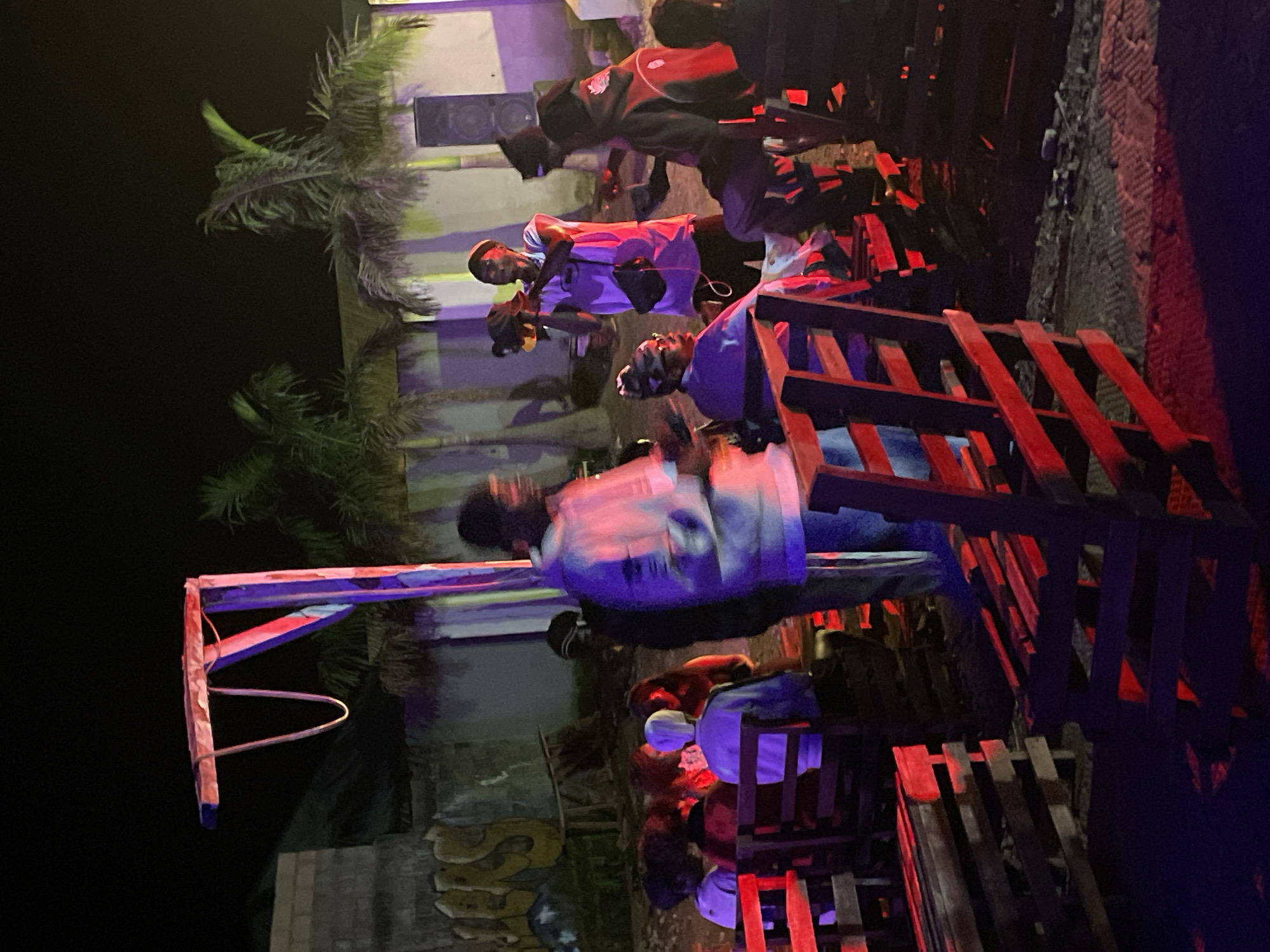 Late-night block party in Durimi, Nigeria with DJ and street vendors