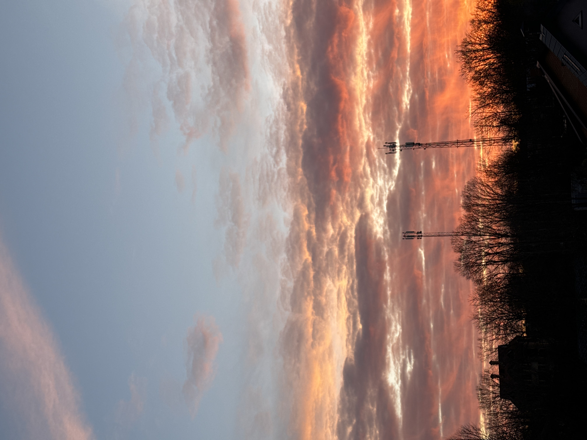 Dramatic sunset colors fill sky over Carnikava, Latvia