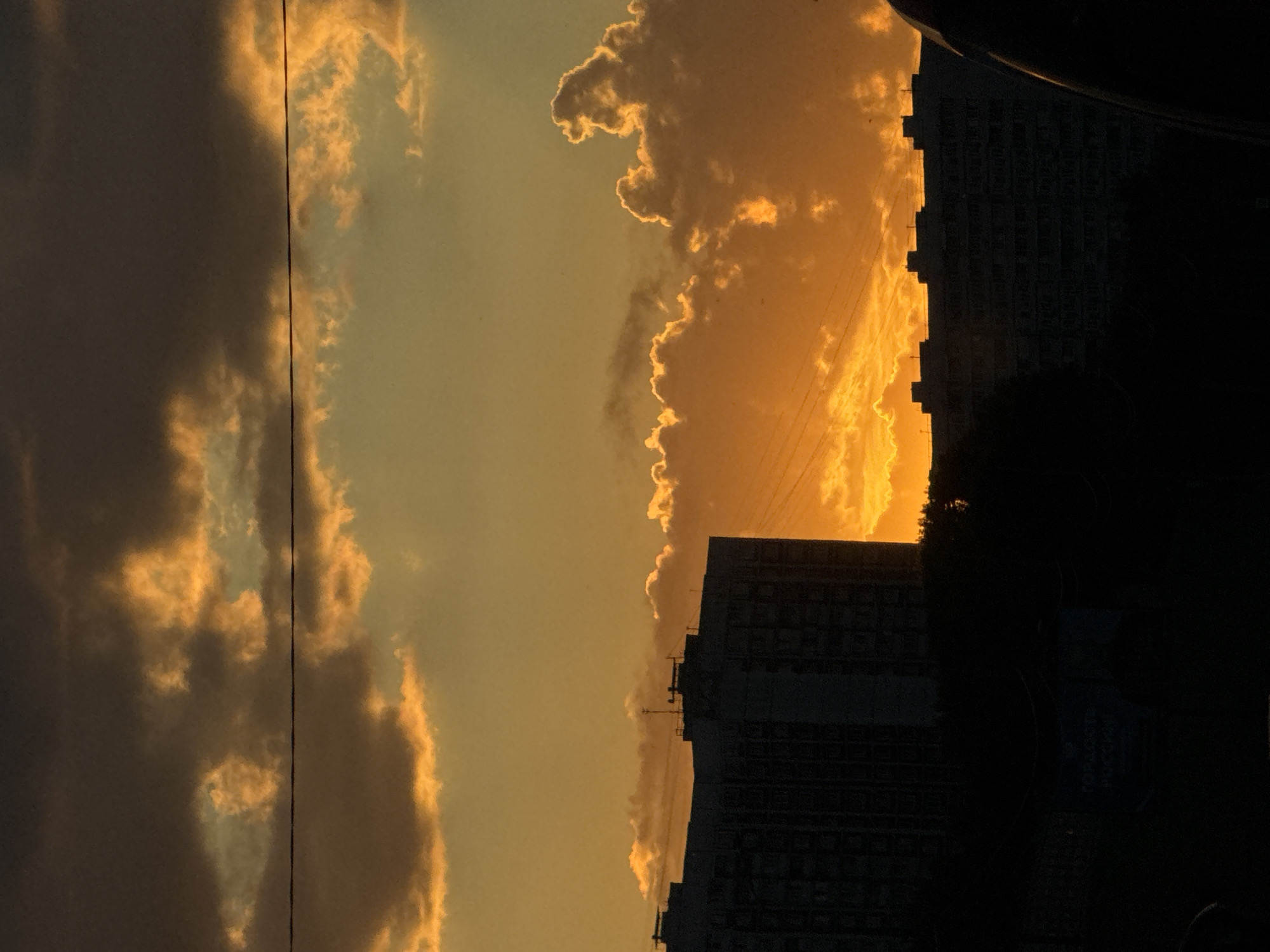 Dramatic sunset illuminates cloudy Moscow sky