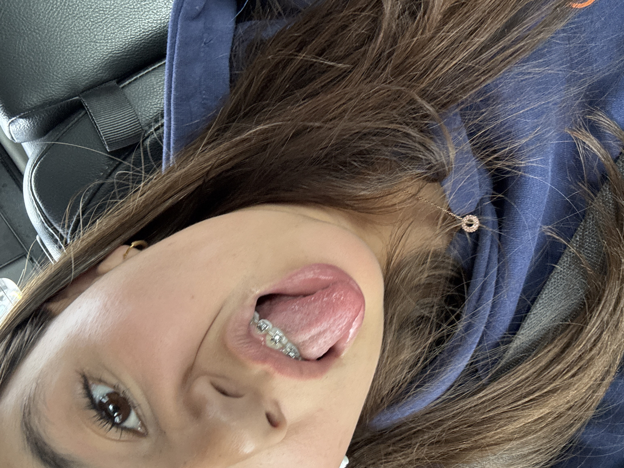 Woman takes selfie in vehicle in Austin