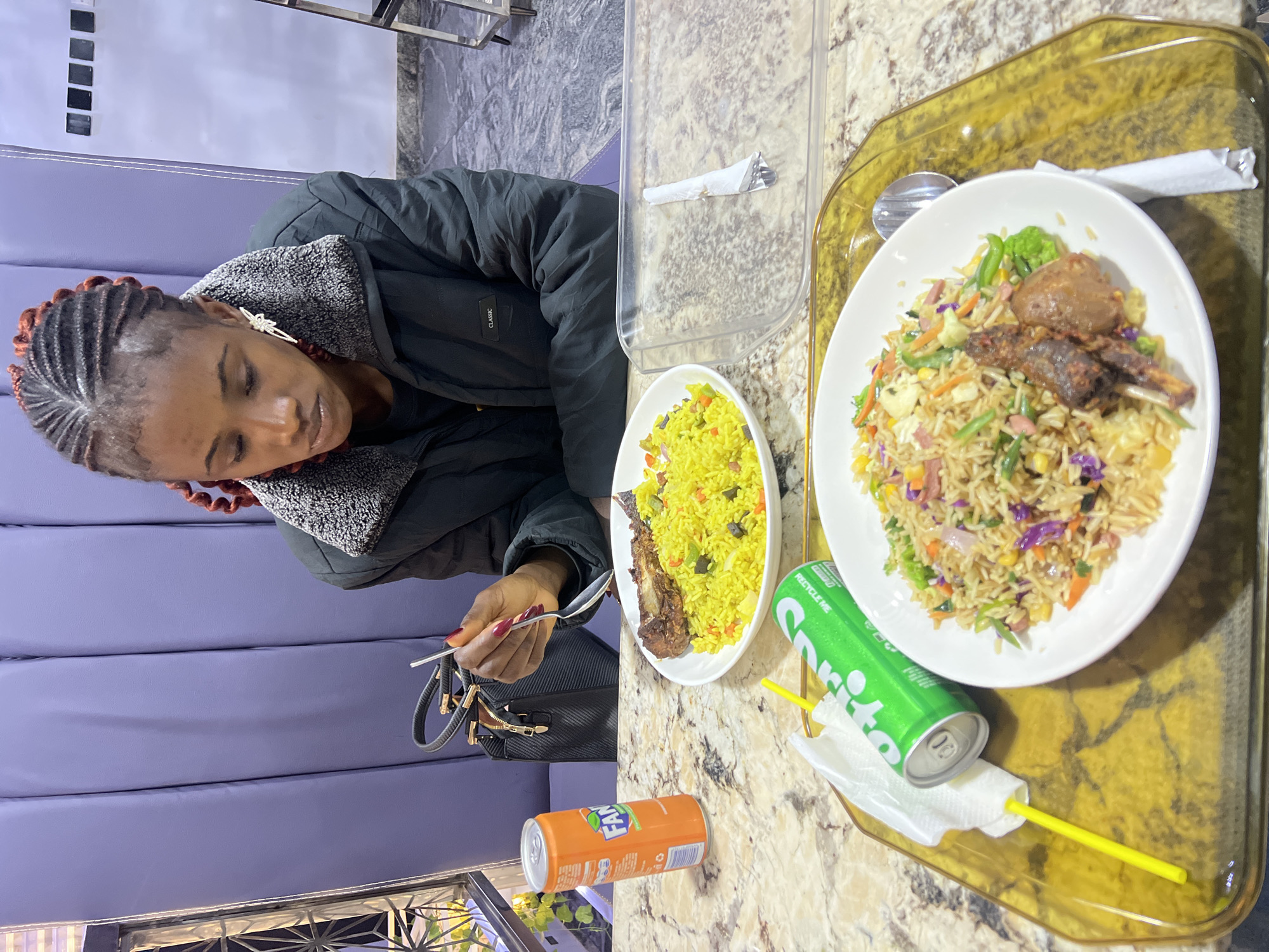 An afternoon moving through Jos: streets, food, and rain