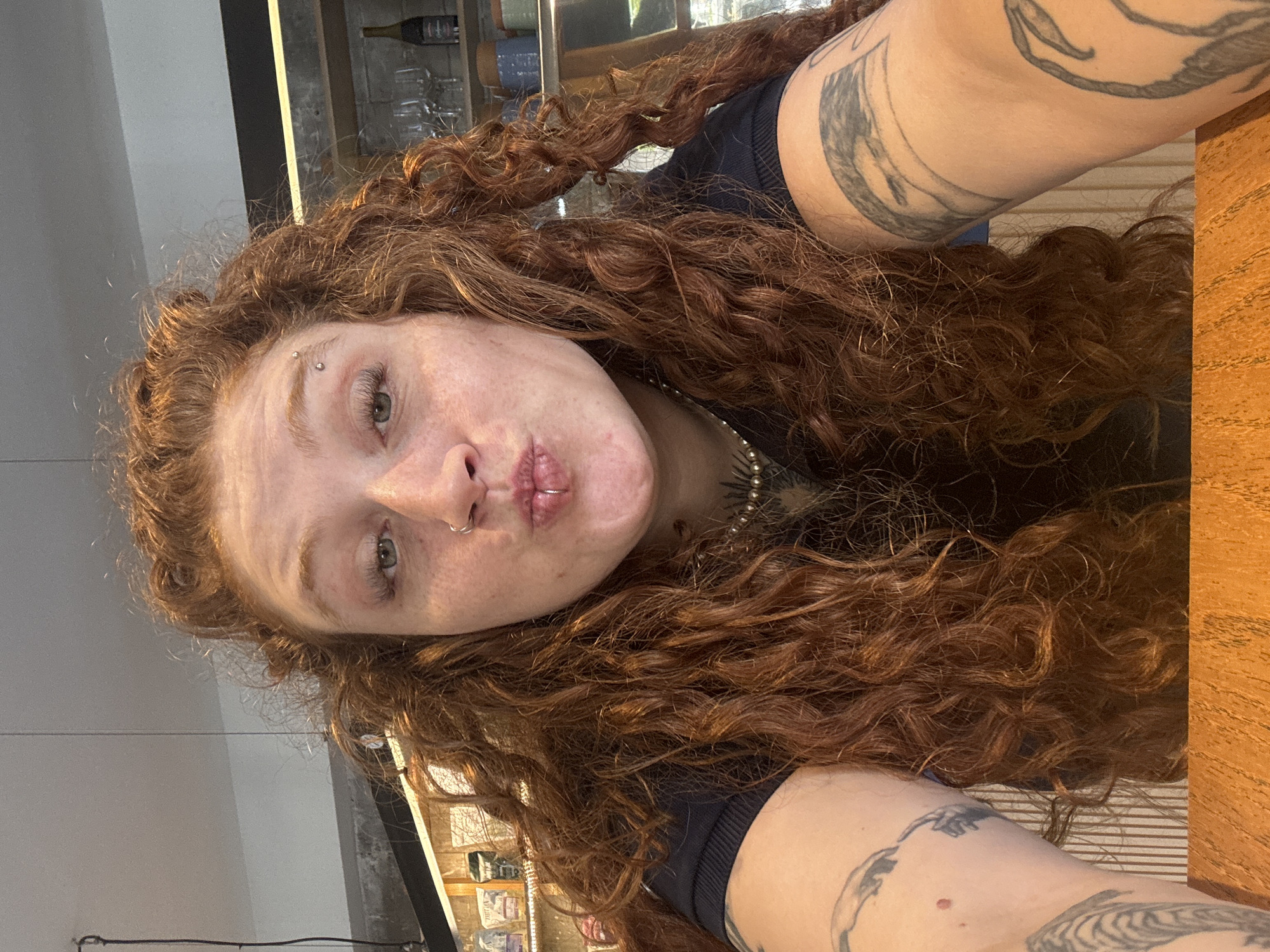 Woman documents restaurant meal with selfies in Buenos Aires