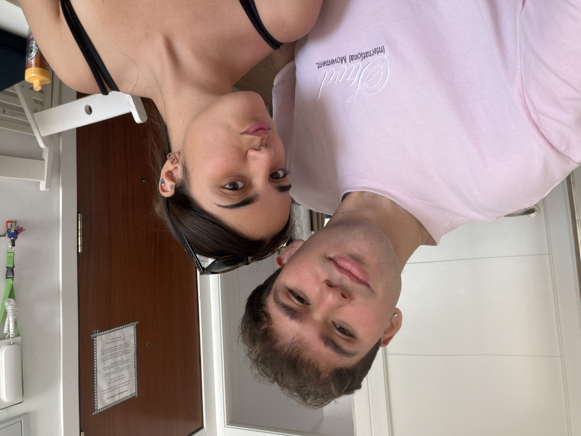 Couple takes casual indoor selfie in Burjassot, Spain