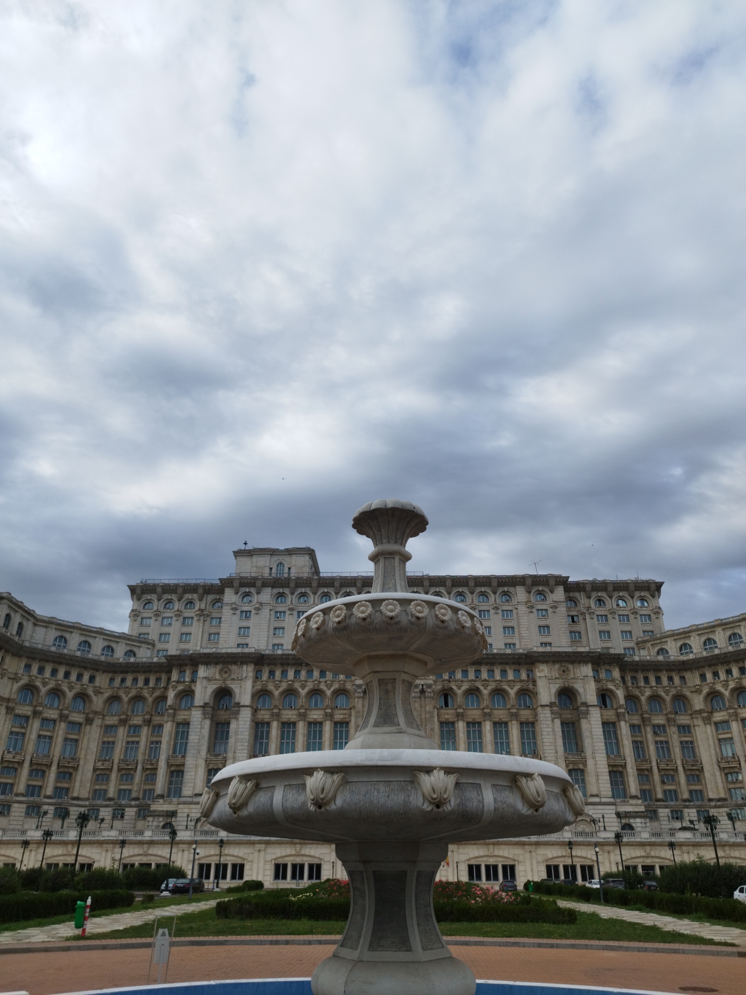 Around a monumental Bucharest landmark on a cloudy morning