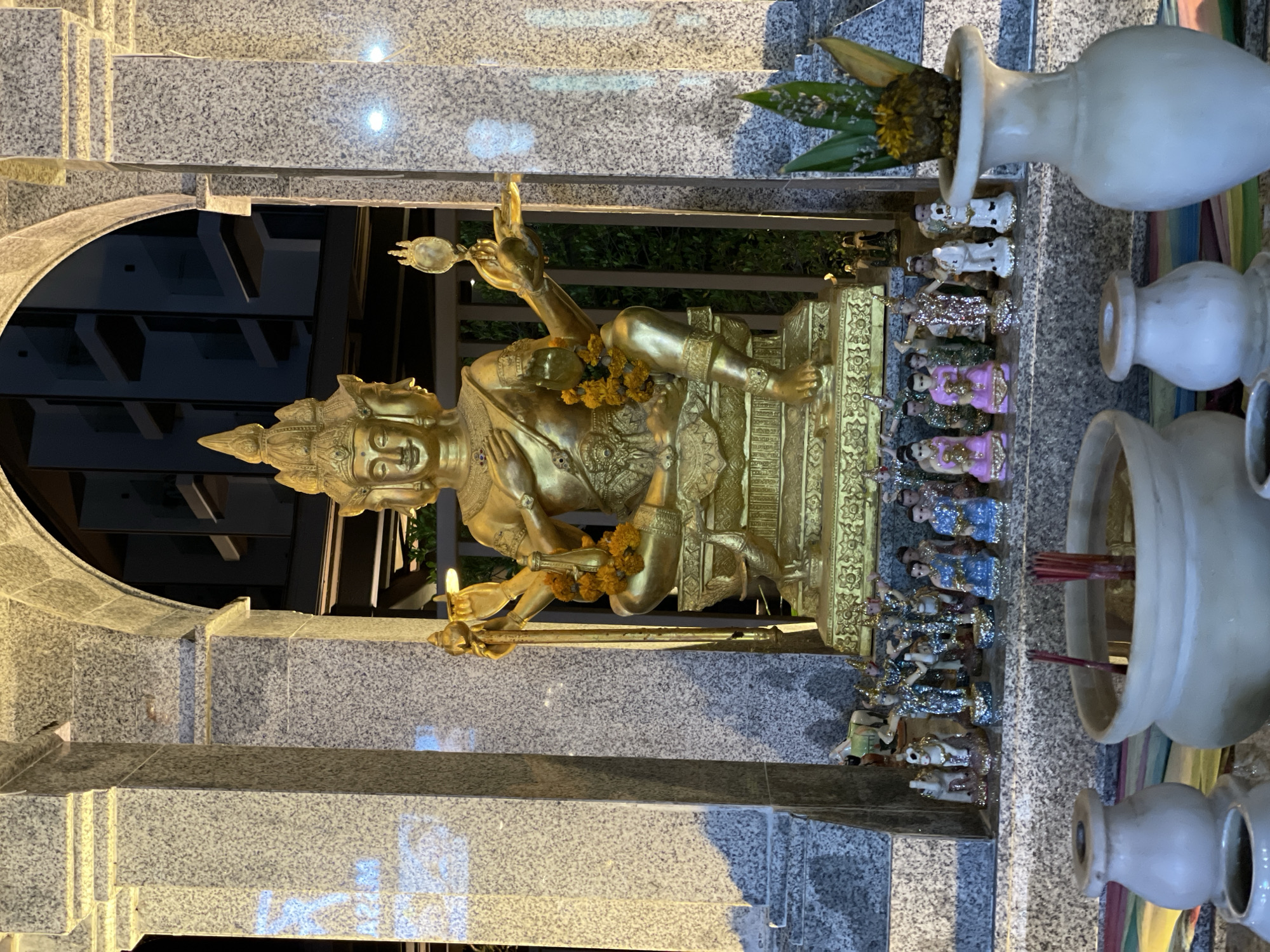 Tourist observations document Brahma shrine and nightlife in Karon, Thailand