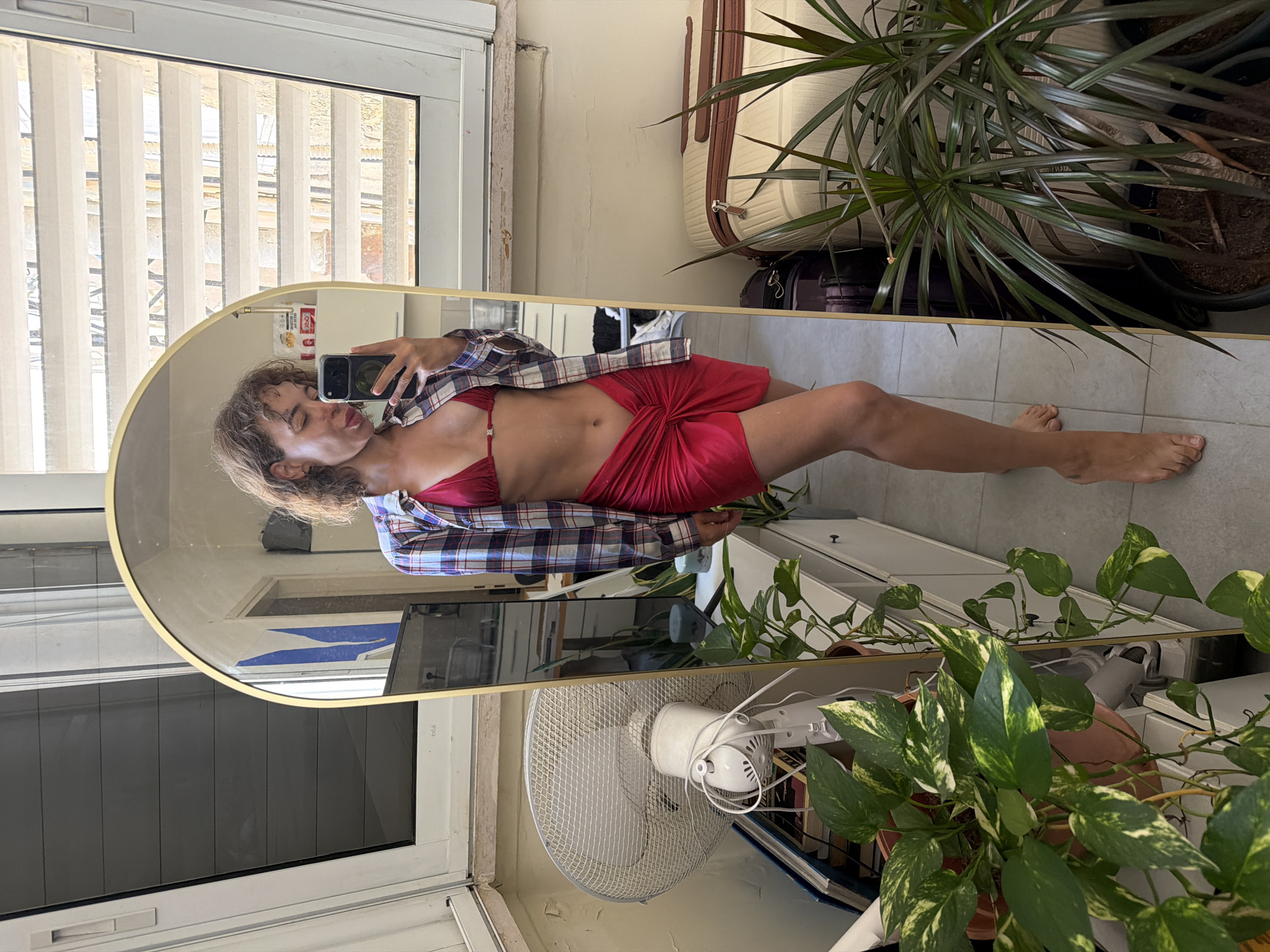 Mirror selfie in Tel Aviv, red bikini and skirt combo