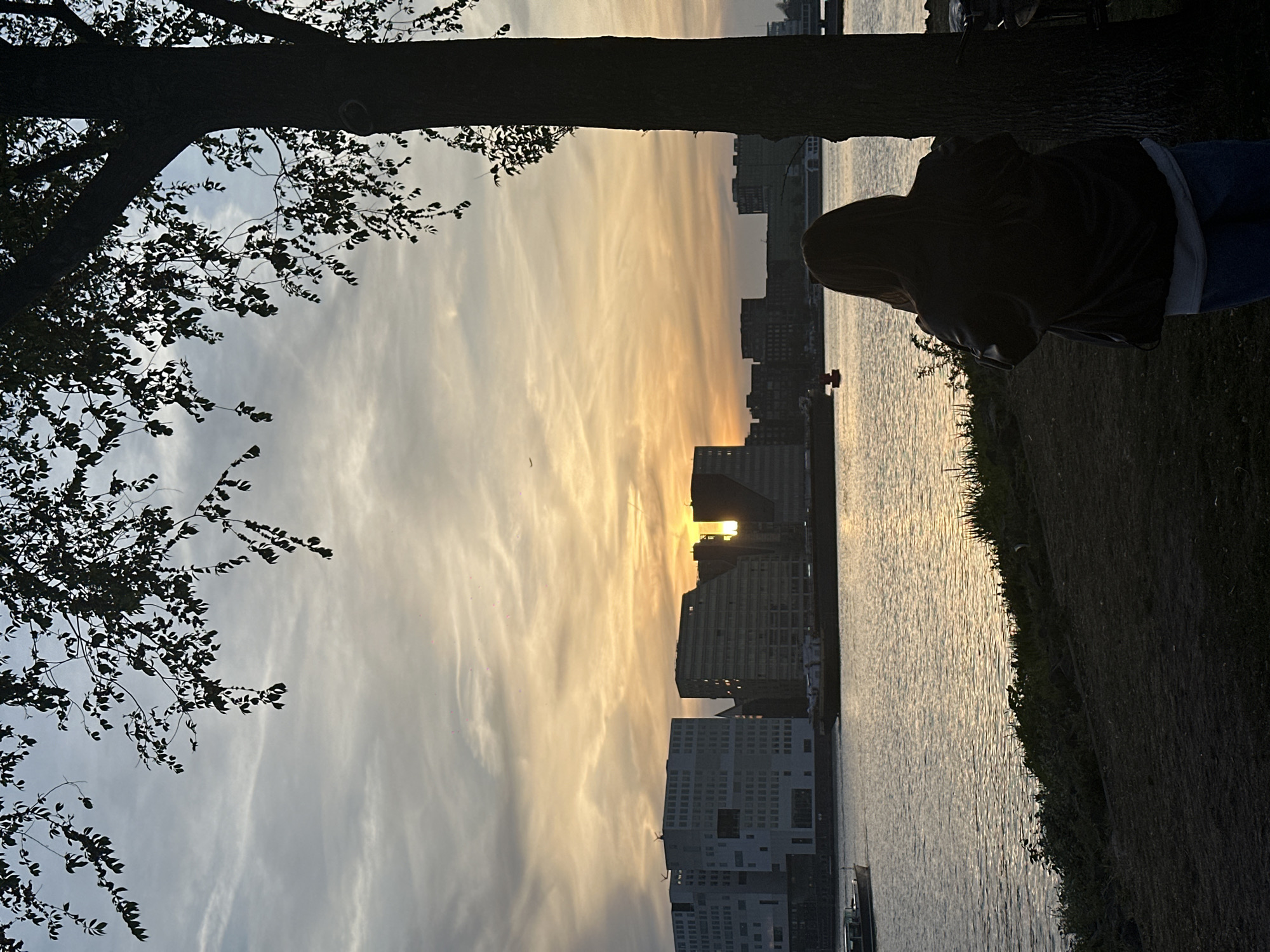 Sunset observed across Amsterdam waterfront and central station