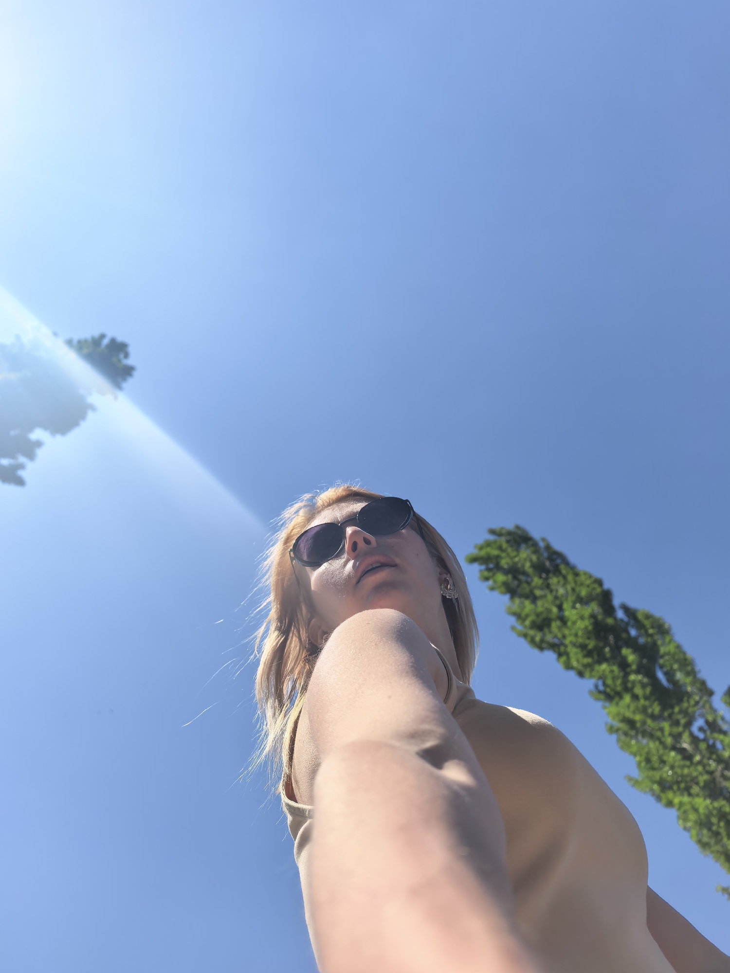 Woman takes selfies during morning walk in Sterlitamak, Russia