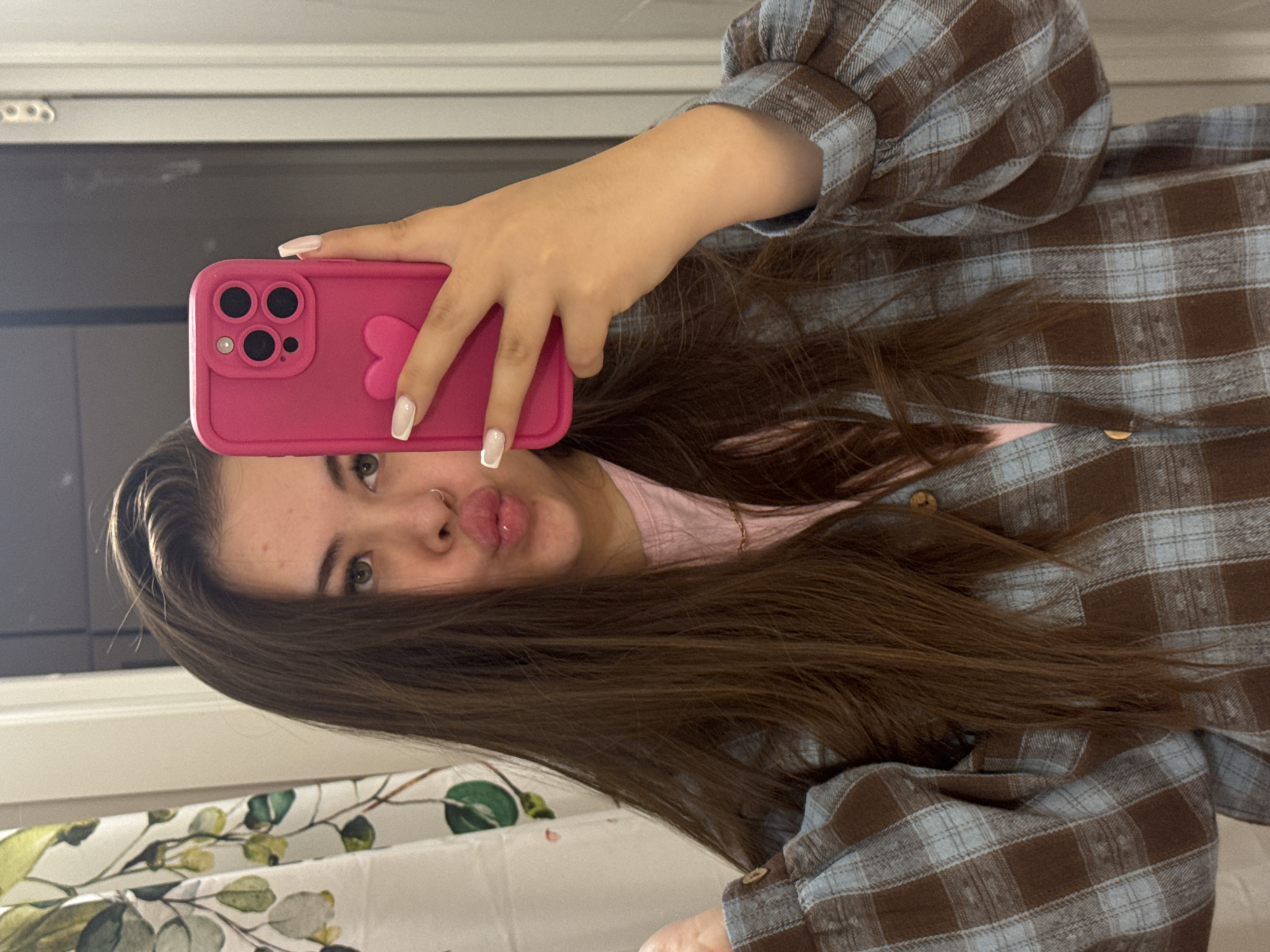 Woman takes bathroom selfies in Murino, Russia at dusk