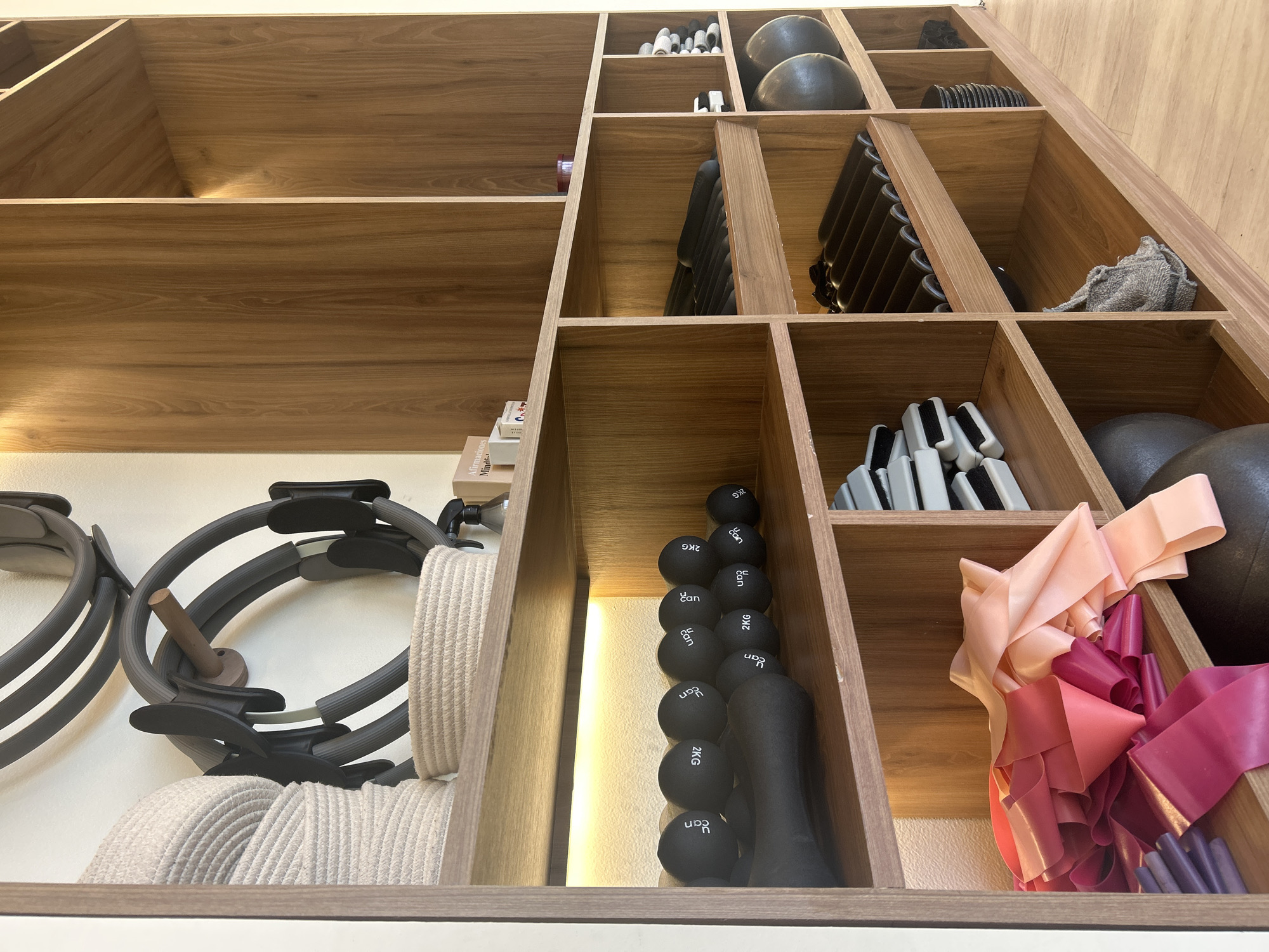 Fitness studio activity documented during equipment organization session