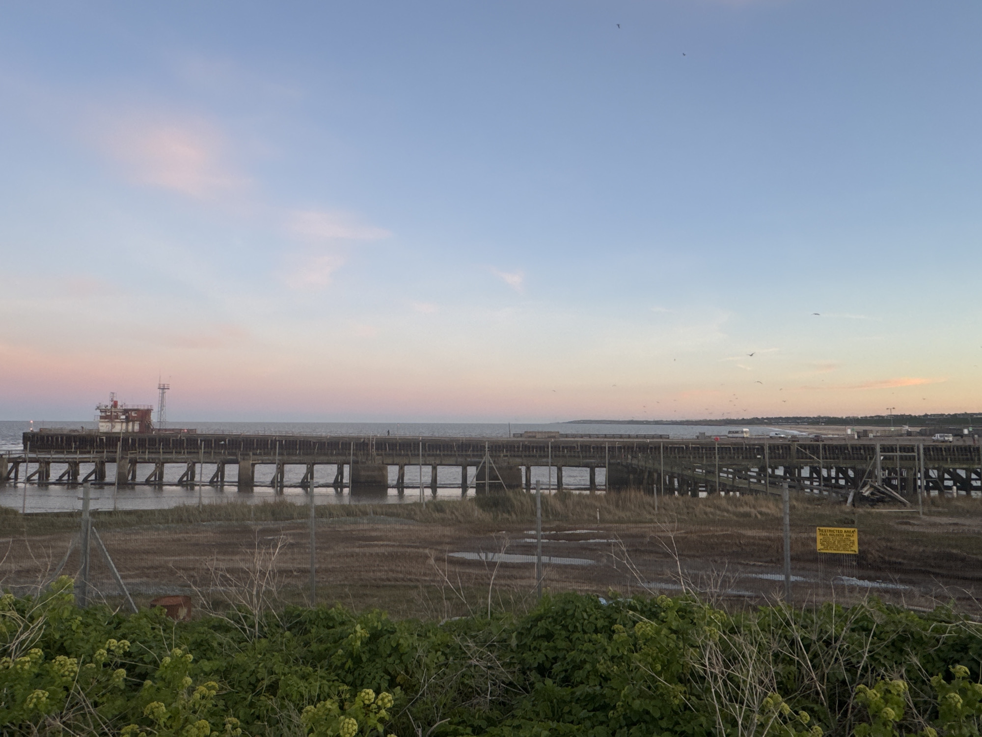 Sunset observed across Gorleston-on-Sea pier and coastline