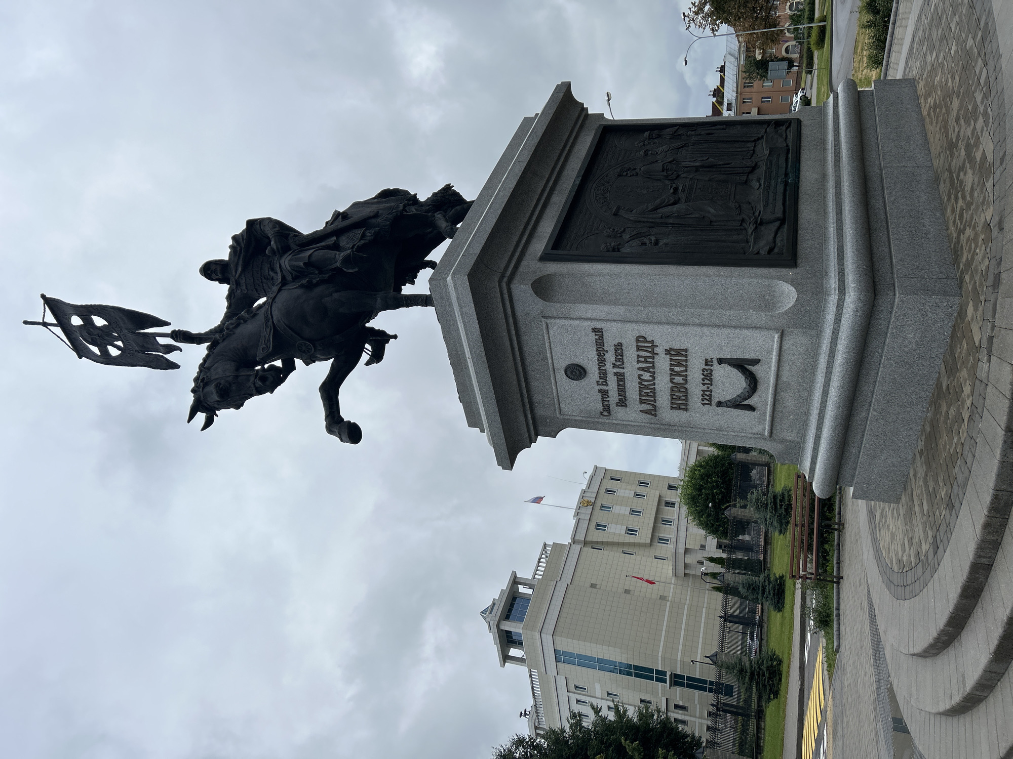 Alexander Nevsky monument and Russian-flagged building in Minsk