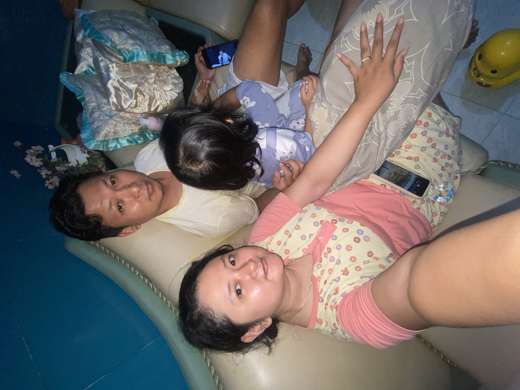 Family gathering with children's play documented in Gelam, Indonesia