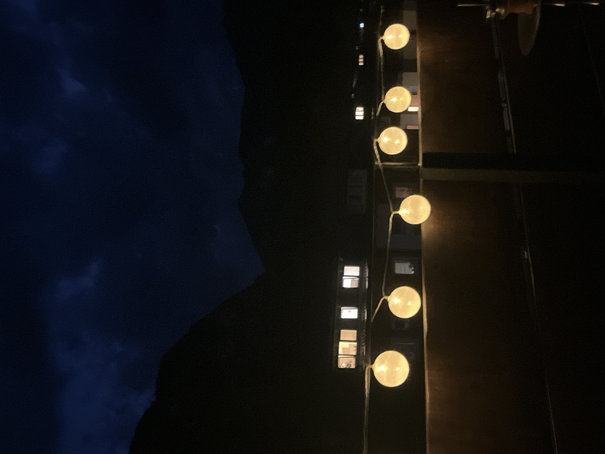 Evening balcony views with string lights in Garmisch-Partenkirchen