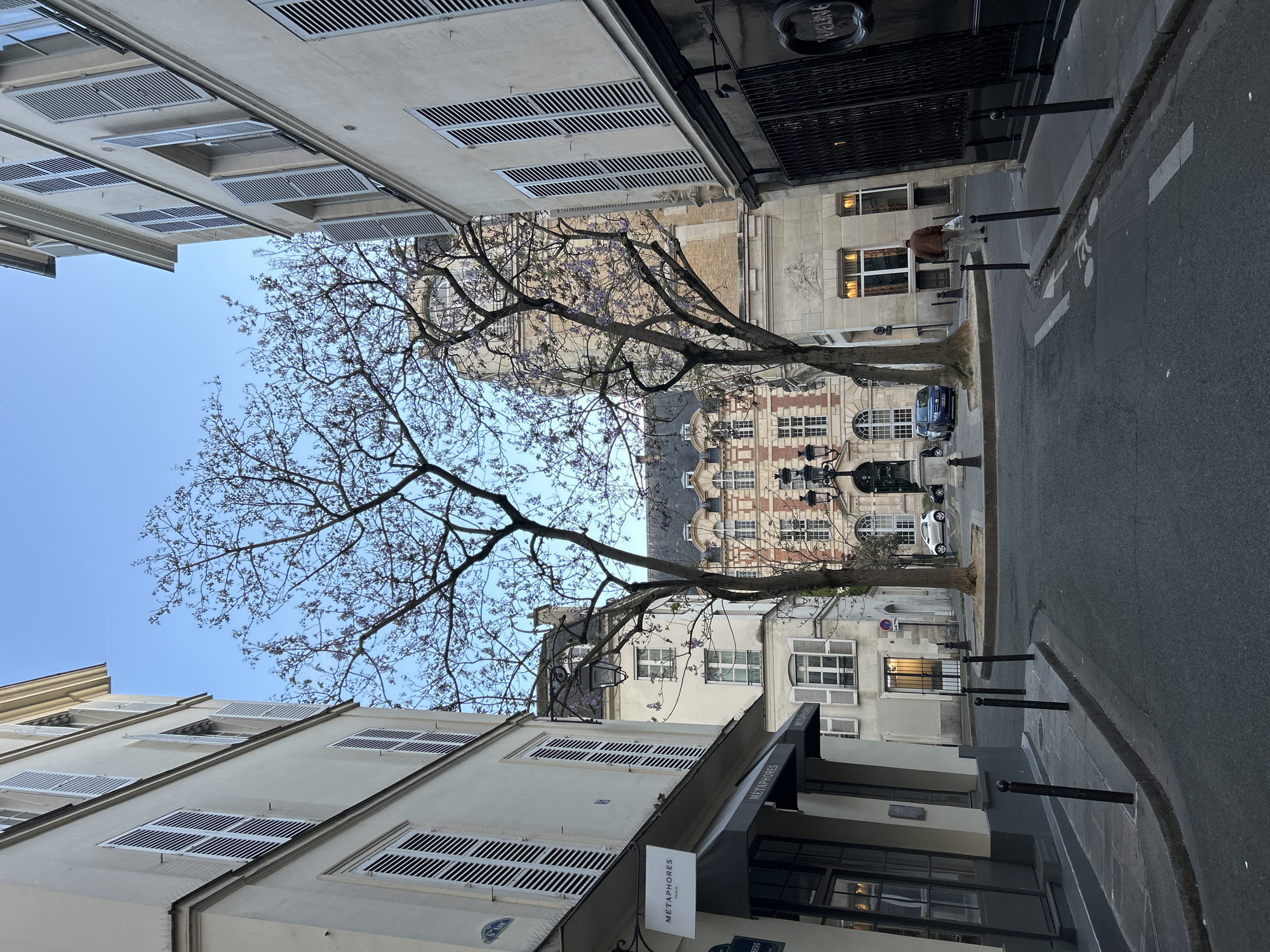 Spring afternoon walk through narrow Paris streets captured