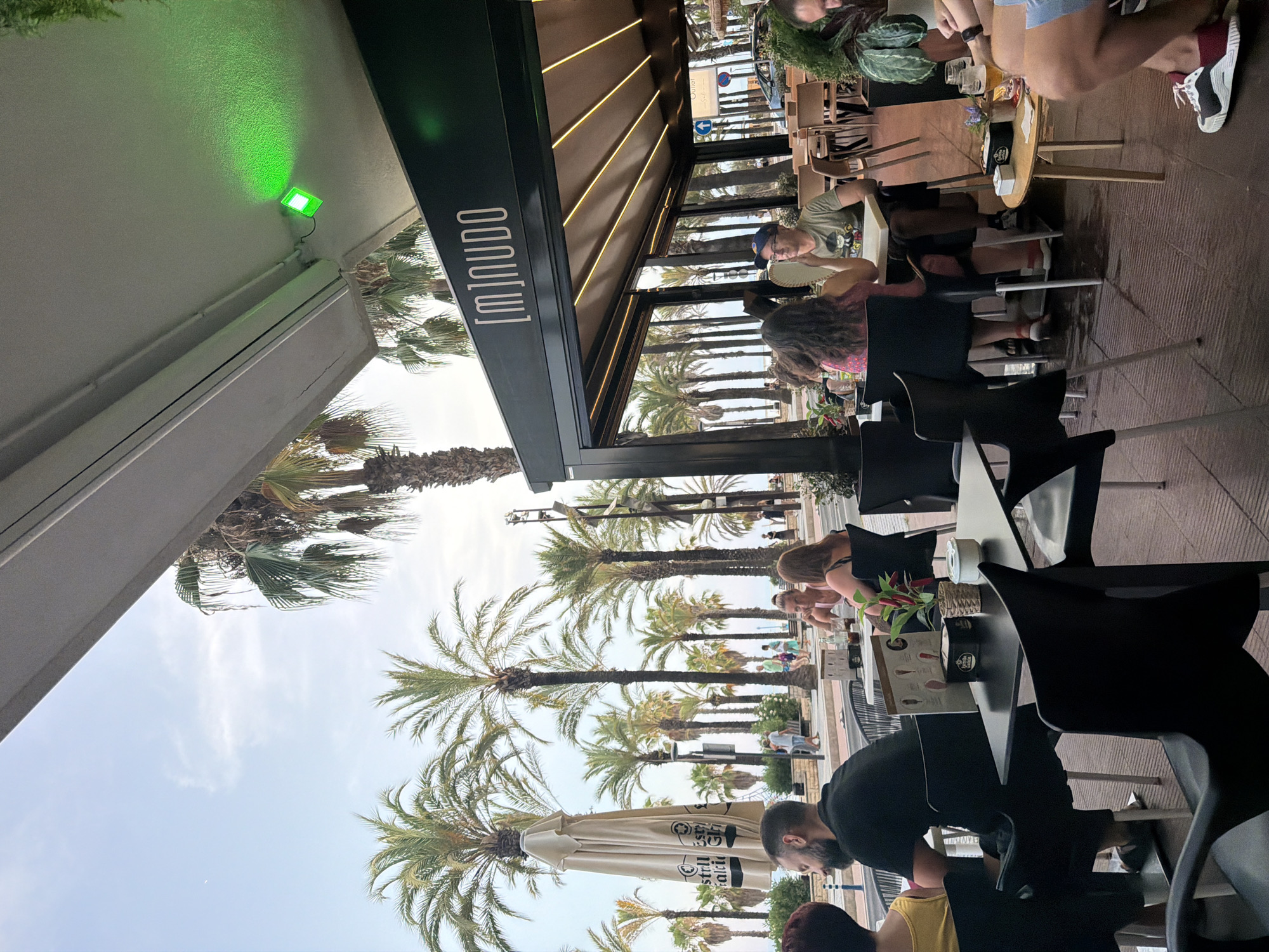 Outdoor café scene in Salou on a warm summer evening