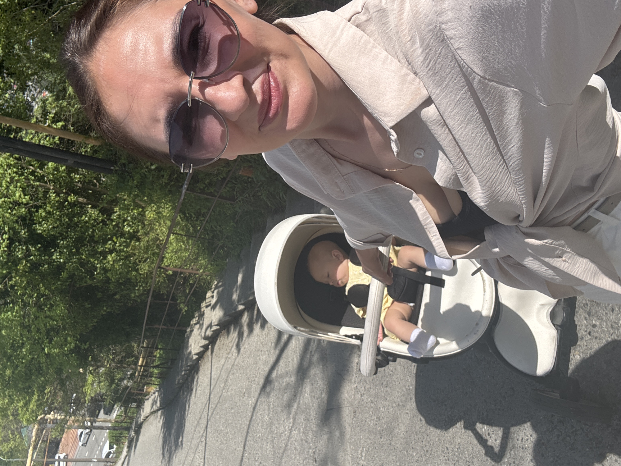 Mother enjoys outdoor moments with baby and dog in Sochi