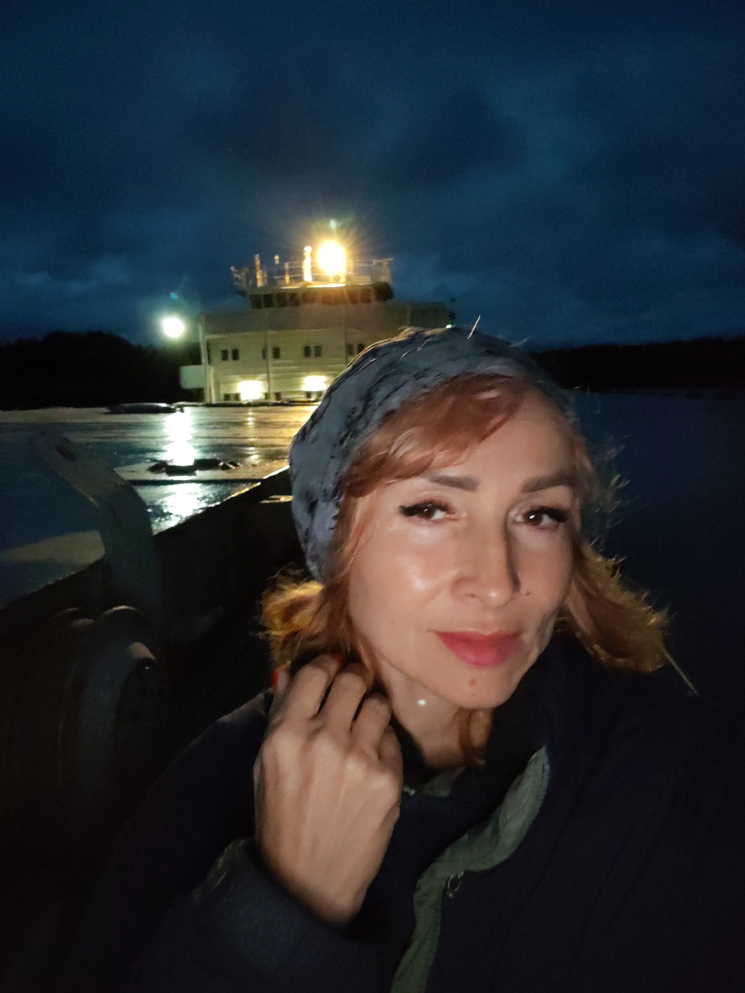 Ferry navigates a night lock on Russia's Devyatiny canal