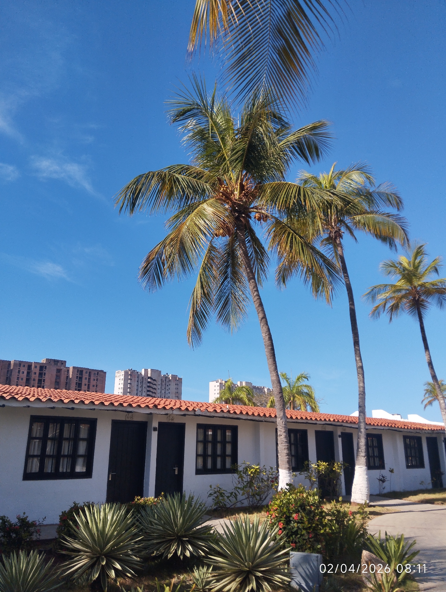 White building with red roof documented in Porlamar