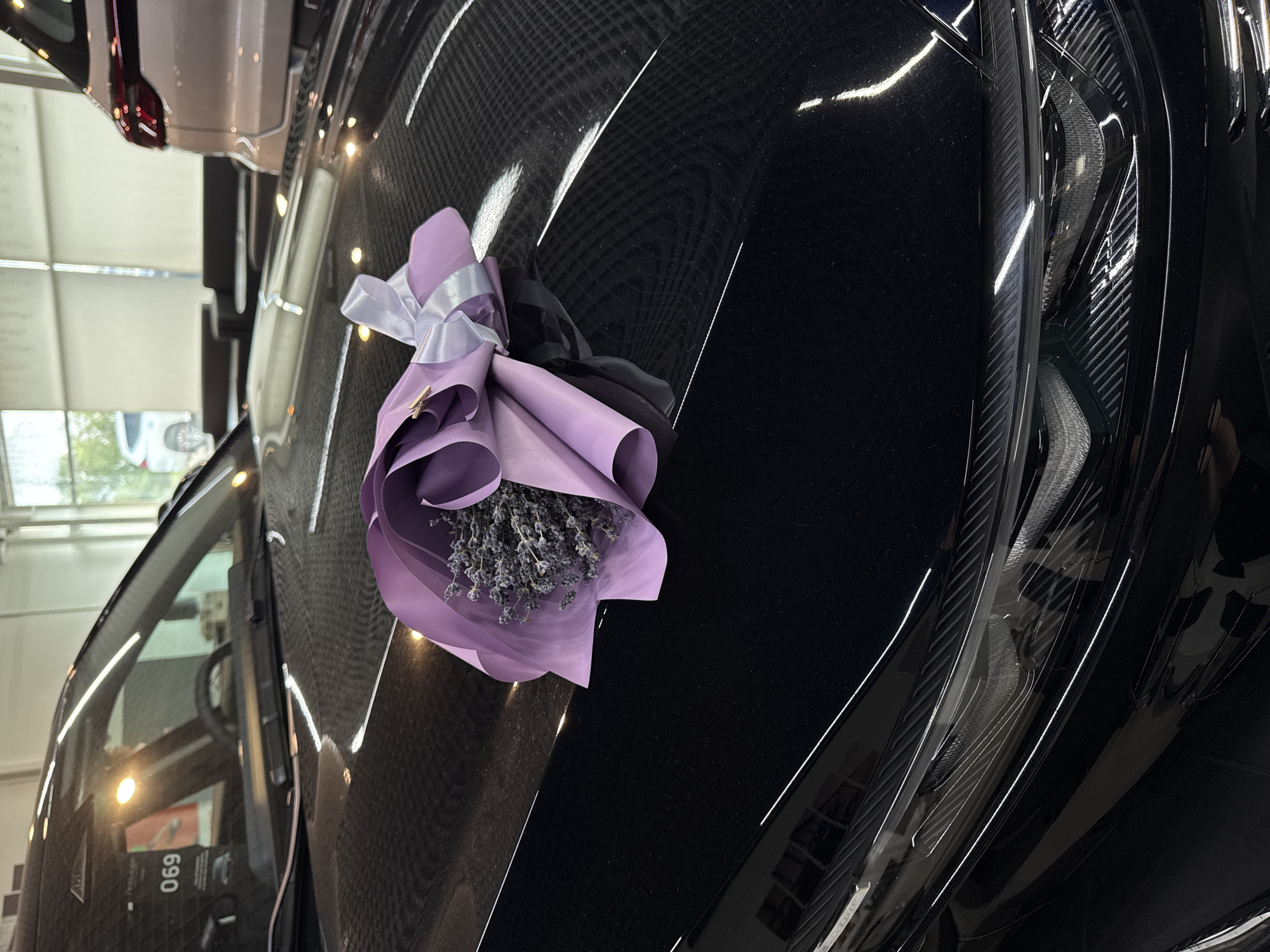 Car dealerships in Nizhny Novgorod present decorated vehicles with flowers
