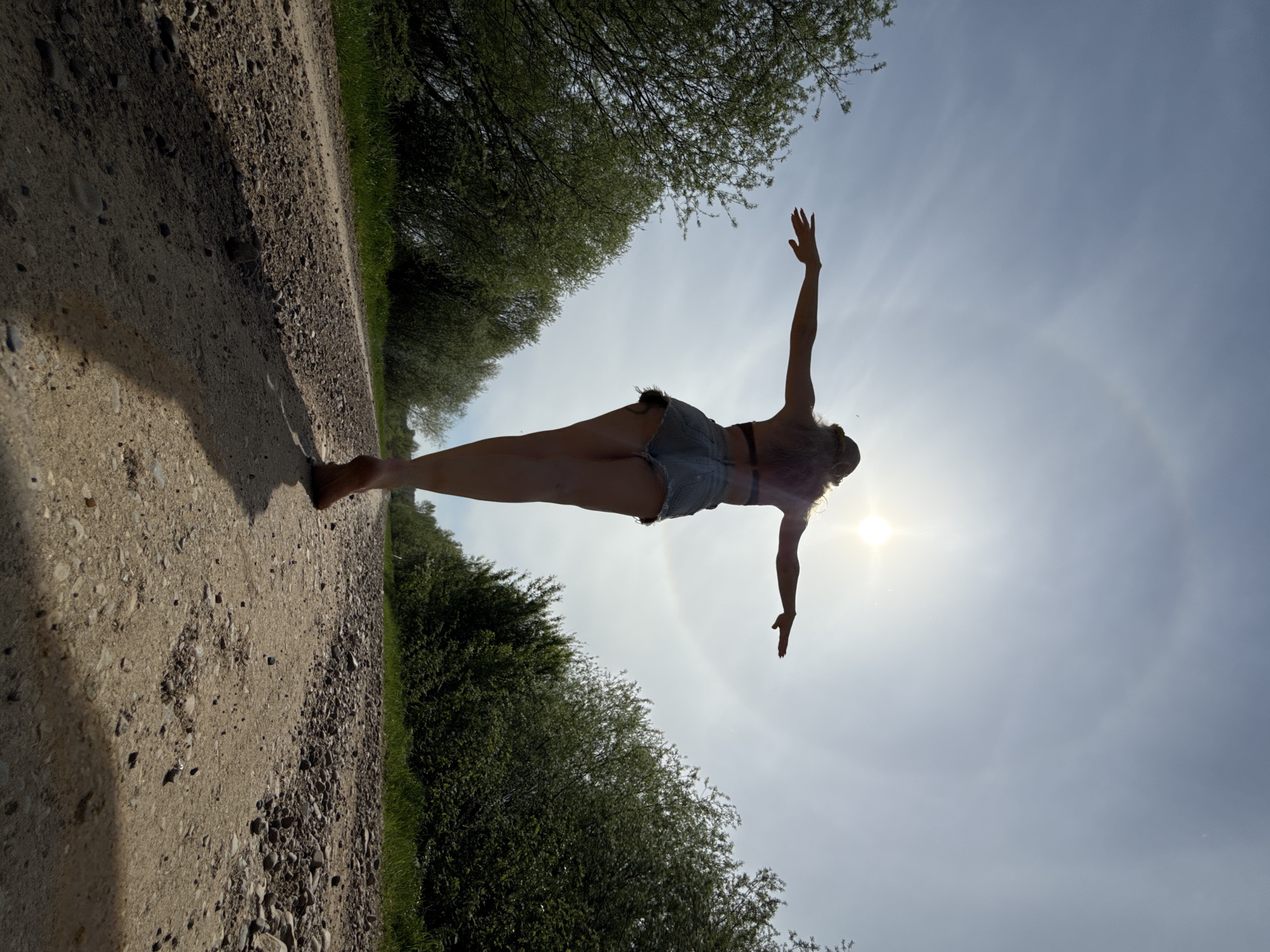Woman poses for rural photo session in Russian countryside