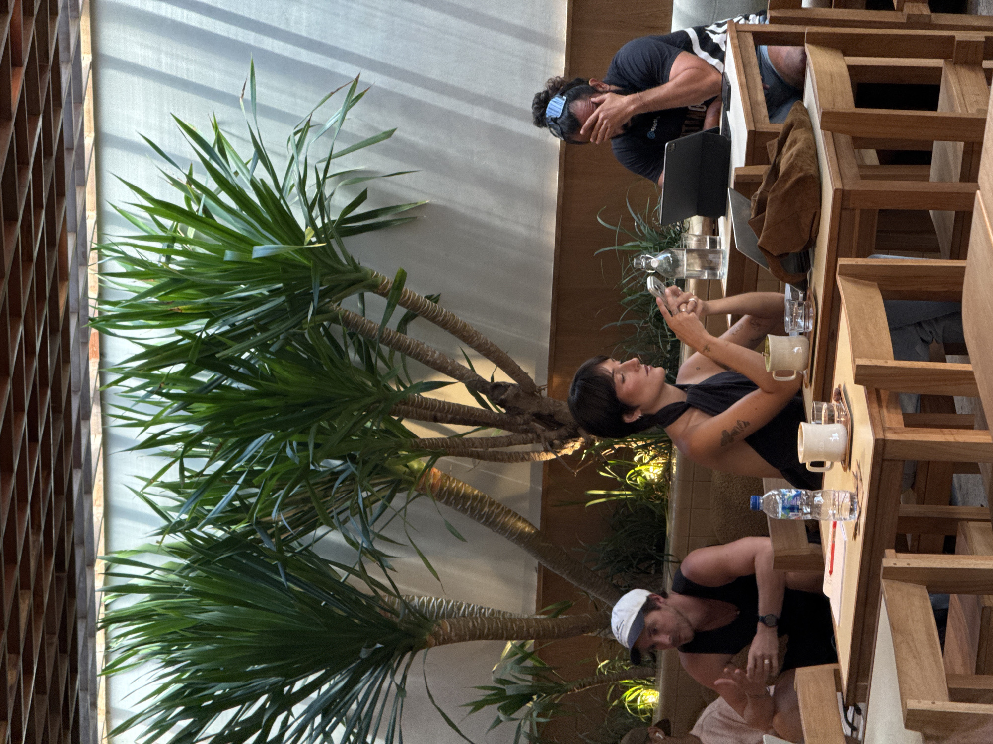 Man works on laptop at North Kuta cafe