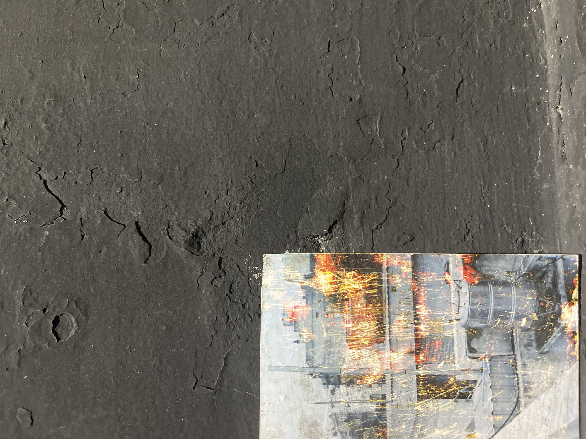 Mysterious poster spotted on textured wall in Buenos Aires